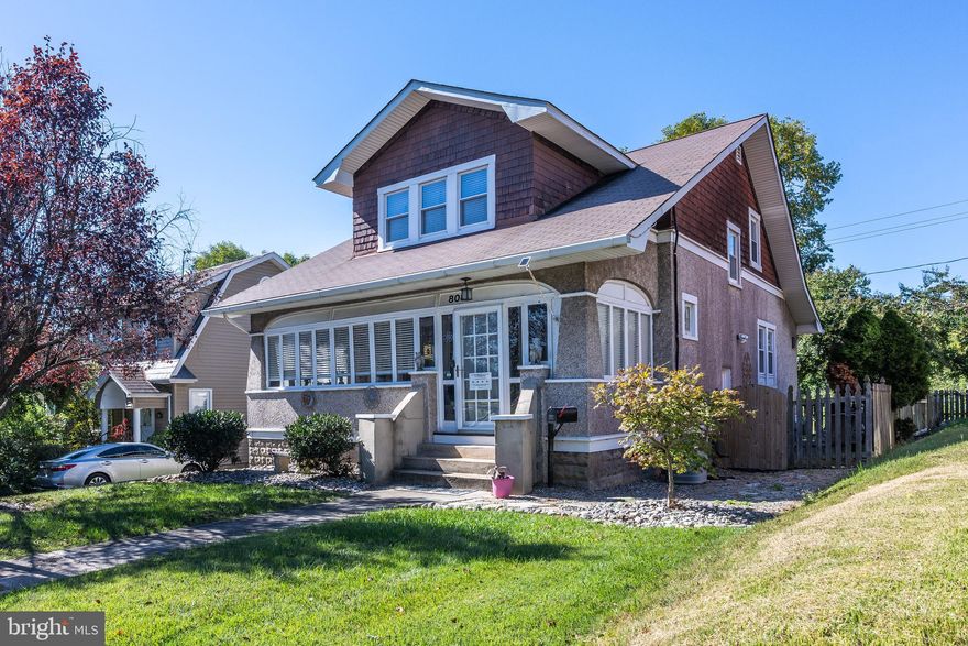 Step into timeless elegance and modern comfort in this beautifully updated Craftsman-style home, ideally situated in the heart of the beloved Catonsville community. This residence perfectly blends historic charm with thoughtful modern upgrades, offering both beauty and functionality at every turn.

Inside, you'll find original architectural details such as wide wood trim and stunning stained-glass windows, seamlessly complemented by contemporary finishes. The kitchen features porcelain tile flooring, quartz countertops, and high-end KitchenAid appliances, while the bathrooms have been fully renovated with porcelain tile and stylish fixtures. Throughout the home, luxury vinyl plank flooring and smart lighting create an elevated yet comfortable living experience.

The finished lower level offers exceptional versatility with a second kitchen, full bath, and private entrance, space for a potential bedroom —ideal for an in-law suite, guest quarters, or potential rental income opportunity.

A light-filled enclosed sun porch adds additional living space, perfect for a home office, reading nook, or morning coffee retreat.

Outdoor living is just as inviting, featuring multiple areas to relax or entertain: a private side deck courtyard, a large flagstone patio with a full-size freestanding outdoor fireplace, and a  fully fenced backyard backing to open green space and trees. 

The voluntary HOA fosters a true sense of community with events such as block parties, Halloween parades, Easter egg hunts, and neighborhood yard sales—making this one of Catonsville’s most welcoming areas.

Additional updates include a new boiler and water heater (2019). Conveniently located near shopping, restaurants, commuter routes, the MARC train, and within walking distance of UMBC.

Schedule your visit today and discover the perfect combination of classic Catonsville character and modern living!