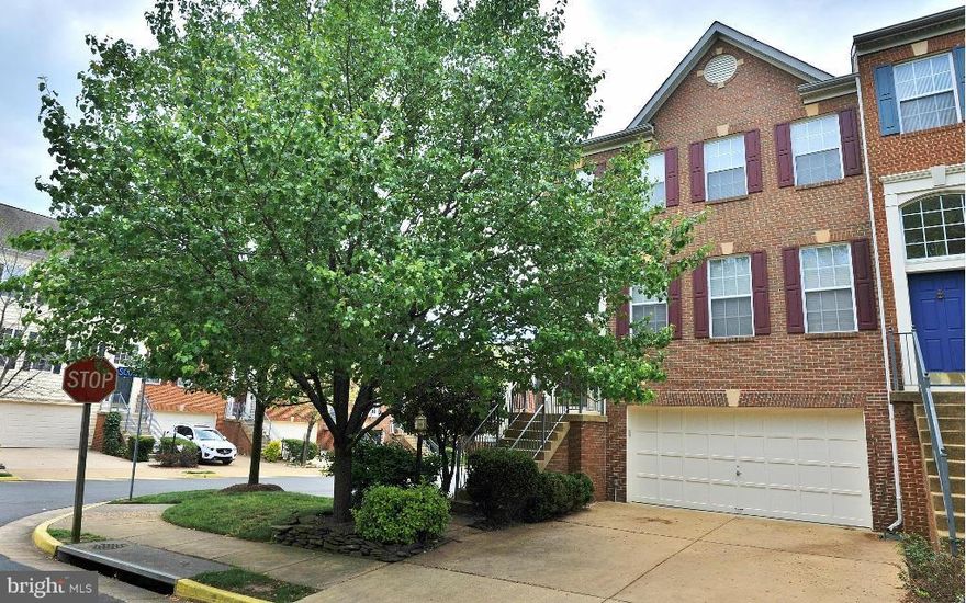 Welcome to 5301 Jesmond Street, a gorgeous brick-front end-unit townhome with a 2-car garage located in Alexandria’s  sought-after community of Kingstowne! This 3 bedroom, 2 full and 2 half bath Foxhall model is light, bright and appealing throughout. The spacious living-dining room combo offers crown molding, a chandelier, and multiple windows that bathe the room in natural light. The well-equipped kitchen features 42 inch cabinetry, Silestone countertops, a custom backsplash, center island with an overhang for barstool seating, recessed lighting, an expansive pantry, and a sun-lit breakfast area with a French door to the deck.  Located off the kitchen is a terrific family room that has a relaxing gas fireplace with a marble surround.  Relax upstairs in the deluxe primary suite where you will find a vaulted ceiling, 2 walk-in closets, a sitting area, and a luxurious bath with a dual sink vanity, jetted soaking tub, and separate shower.  You and your  guests will enjoy the huge lower level rec room with recessed lighting and a sliding glass door leading out to the fenced backyard with a deck.  A separate laundry room and access to the garage are located off the rec room.  Kingstowne is treasured for its great community amenities including pools, gyms, sport courts, tot-lots, clubhouses, walking trails & so much more! In addition, this fine home is only minutes from Metro, all commuter routes, Wegmans, & two Town Centers! It’s also just a quick hop to Old Town Alexandria.