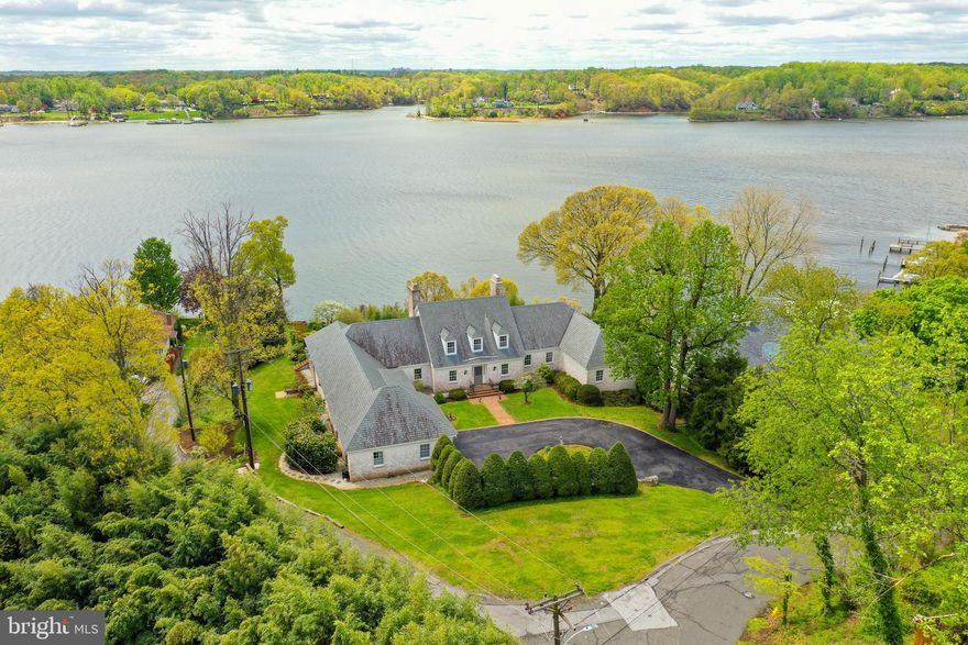 Located in sought after Winchester-on-the-Severn, this timeless Cape Cod is perfectly situated on one of the most prominent overlooks in Annapolis. With sweeping views of the Severn River and tailored, cascading gardens offering a Spring burst of color, this home is a "must have". Over 4,900 finished square feet with water views from almost every room of the home. Winchester-on-the-Severn amenities include a private beach on the Severn River, boat ramp, piers, marina, beach pavilion, and playground. Nearby Route 50 provides easy access to Baltimore and Washington, D.C.