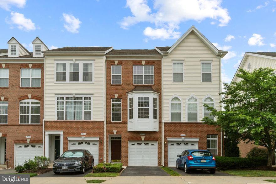 Beautiful 3 level townhouse with 1 car garage available for rent in Belmont Country Club!  This townhouse features an updated kitchen with island, granite counters, stainless steel appliances and plenty of cabinet space.  Off the kitchen is a breakfast area and access to the large deck that backs to trees/wooded area perfect for relaxing or entertaining.  This level also features the open concept light and bright living and dining areas. The upper level features 2 huge primary bedrooms each with their own primary full baths.  The lower level features a spacious rec room, full bath and is walk out level.  Backyard is complete with patio and is fully fenced.  RENT INCLUDES basic cable & internet and Belmont amenities.  Conveniently located near shopping, dining, One Loudoun, Lansdowne and near all major commuter routes.  Great Schools!! Dog accepted case by case with pet deposit and pet rent.