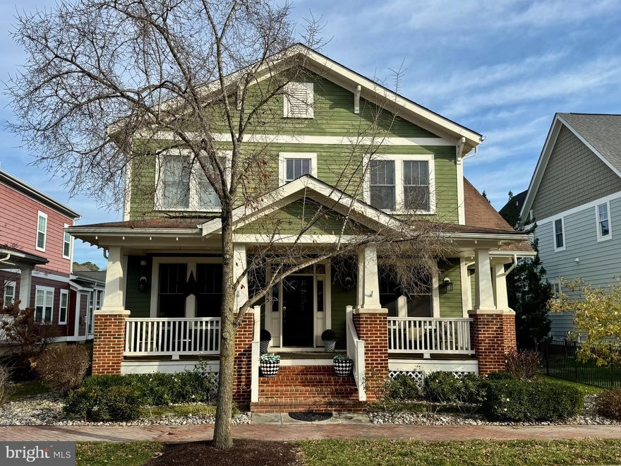 Expected date for available showings 12/26/25 - Easton Village - Custom built in 2007 featuring an ipe front porch and rear patio with hot tub, fenced yard, formal living/dining areas, first-floor primary suite with large closets, and high-end bath features. The kitchen has a center island joining a two-story family room with a gas fireplace. The second floor includes a landing overlooking the family room, along with three bedrooms and two baths. This property was previously a model home for Easton Village with a finished showroom garage, including a mini-split for heating and cooling. With over 4,000 square feet, this home has gracious room sizes.