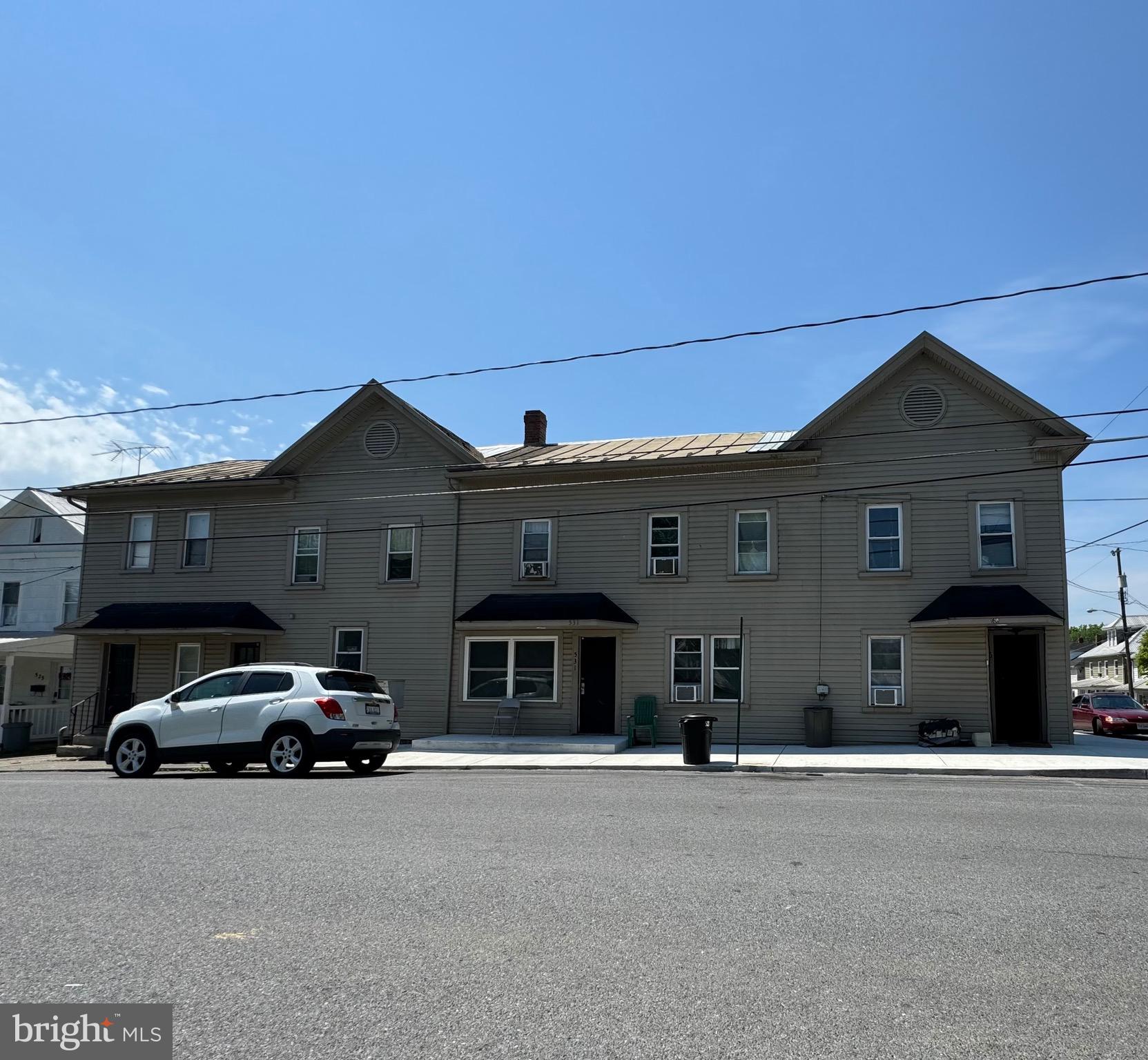 7 UNIT APARTMENT BUILDING in downtown Martinsburg located a block from the Berkeley Co. Sheriff's office. This building has three 2BR/1BA, two 1BR/1BA, and two studios. All units are rented with annually renewed leases in place. Fabulous opportunity to add 7 units to your rental portfolio with one purchase.