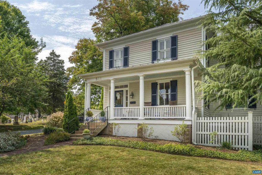 Ideally located in Charlottesville's coveted North Downtown neighborhood, this elegant c1900 farmhouse seamlessly marries the charm and character of a 125-year-old home with modern renovations and additions to create an amazingly comfortable and livable 21st century showpiece.  5 bedrooms, 3 full baths, an open kitchen/family room combination, luxurious and private primary suite, gorgeous formal dining room.  Abundant natural light, quality finishes and tasteful features throughout.  The corner lot is a lush and private downtown oasis, oriented away from neighbors and traffic.  Maplewood Cemetery makes an excellent neighbor, providing a private and quiet park-like atmosphere with minimal noise and light pollution.  The backyard patio area is the perfect spot for morning coffee, summer dining, and autumn gatherings around the wood-burning fireplace.  A fully finished detached outbuilding can serve as exercise room, private home office space, or even an ADU.  New standing seam metal roof in 2020, conditioned crawl, fully updated kitchen and baths...this property is turn-key.  Location is as walkable as Charlottesville gets yet buffered from commercial activity to maintain residential feel.  Ample parking, both on and off street.,Granite Counter,White Cabinets
