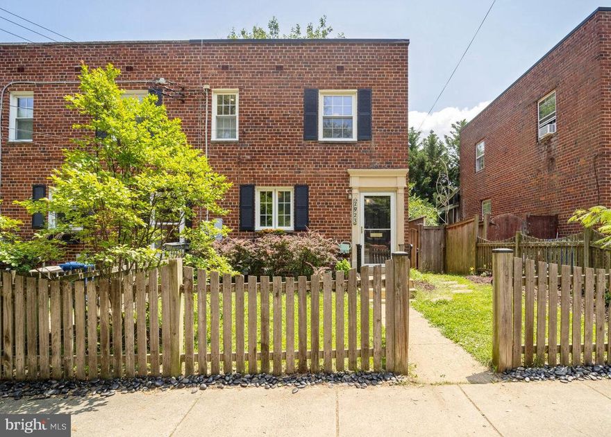 Welcome home to this updated end unit in highly sought after Warwick Village!   As you enter the home, you're greeted with sunlight and warm wood floors.  The wood floors carry on throughout the main and upper levels.  You'll love entertaining with the spacious kitchen, complete with granite counters, and stainless appliances.  The wall between the kitchen and living area was partially removed, allowing for more light, and creates a smooth transition from the kitchen into the main great room.   The kitchen features a rolling island making meal prep and cooking a breeze.  As you progress upstairs, you'll find three bedrooms and a recently updated bathroom.  The bathroom is modern and stylish with a grey and white color scheme.   This home features a finished basement that has also recently been updated with newer flooring, lighitng, and paint.  Laundry and the second full bath are in the  basement and also feature the same stylish grey and white color scheme.   An added bonus is the storage room which is large enough to store bikes!   Looking for peace and tranquility?   Step out back onto the large deck, protected by the shade.   It's a perfect spot for grilling or chilling!  Or simply relax by a firepit and enjoy the bird songs in your private oasis.   2923 Landover is conveniently located within walking distance to the main avenue in Del Ray for shopping and dining.   The community also enjoys a playground, and the Warwick Pool which is just a few steps down Landover St.  It's also close to the Reagan Airport, and metro,with a metro bus stop at the entrance to the community.  Welcome Home!