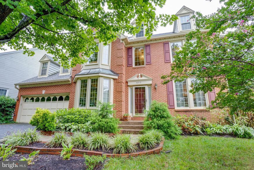 Incredible find in the heart of Fairfax City! Over 4000 sq ft' of finished living space at the end of a quiet street in upscale Crestmont! Attractive hardscaping and lush landscaping make a great first impression! A soaring two-story foyer and rich hardwood flooring and custom banister welcomes you into this immensely livable home. A traditional and functional floor plan includes formal living & dining rooms; a large office; a true chef's kitchen with center island; and a spacious family room complete with a cozy gas fireplace! Enjoy the wall of windows & doors along the entire back of the house providing an amazing view of the flat grassy fenced rear yard with trex deck. The upper level provides four spacious bedrooms along with two spacious full bathrooms. The primary suite is a luxurious refuge at the end of the day, boasting a high ceiling and two walk-in closets. The ensuite bathroom has double vanities, a soaking tub & separate shower.  Relax & play in the fully-finished walk-up lower level complete with rec room; two bonus rooms perfect for overnight guests or a home gym; and a full bath. The Crestmont community is ideally located just blocks to historic Old Town Fairfax with plenty of dining & shopping options; the City of Fairfax Regional Library; and ever-popular Old Town Square which hosts cultural and social events throughout the year! GMU's Fairfax campus is two blocks in the other direction! Don't miss this rare opportunity!