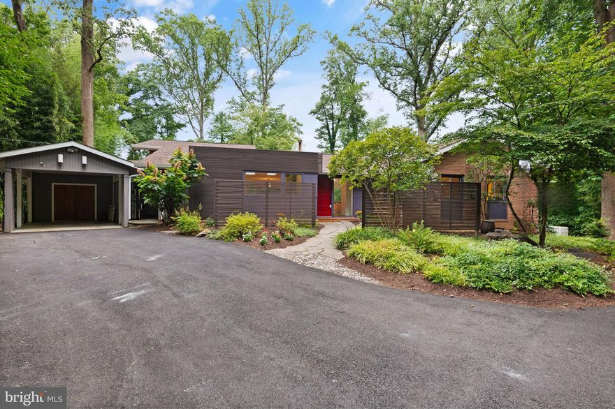 Welcome to 8328 Fenway Road, an exquisite mid-century modern residence in Bethesda's highly sought-after Carderock Springs neighborhood. This home has been expanded front and back and offers wonderful living space, a fabulous open floor plan, and views galore. It is located on a prime lot adjacent to the golf course of the Congressional Country Club. The home's interior features an open layout, allowing for flexible use of the space and abundant natural light through the windows. The renovated family room is ideal for both entertainment and relaxation. The exceptional kitchen includes high-quality cabinets, a Blue Star 4 Burner Gas Stove with griddle, a Miele Microwave, 2 Asko Dishwashers, and a Subzero Fridge with Freezer compartments, making it perfect for hosting celebratory feasts and gatherings of any size. There is a large principal bedroom with an en-suite bathroom in addition to 4 additional bedrooms, 2 more bathrooms, and a walk-out lower level. Home improvements and updates have been made. Most recently (2024): the home was freshly painted. From 2022-2023, the foyer was extended, the kitchen was renovated and relocated from the center of the house to the front, built-in bookcases were put in and a pantry was created. A new roof, dryer, and heat pump were installed as well. In 2021, the water heater was replaced. Come and see this property that is just minutes away from Carderock Springs Swim and Tennis Club, C&O Canal, and Great Falls Park as well as shopping in Potomac Village. One of the most popular neighborhoods in equally close proximity to DC, NoVa, and downtown Bethesda. Don't miss the opportunity to make this property your own!.....Pre-Inspections welcome!!