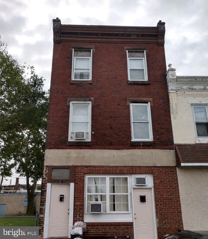 Large street to street property with rear garage.   Non conforming five unit building with three efficiencies and two 1 bedroom apartments.  One unit is vacant.  $2985 total income when occupied.  24 to 48 hour notice required for all showings.  Separate electric.  Sold in as is condition.   Buyer is responsible for U&O.