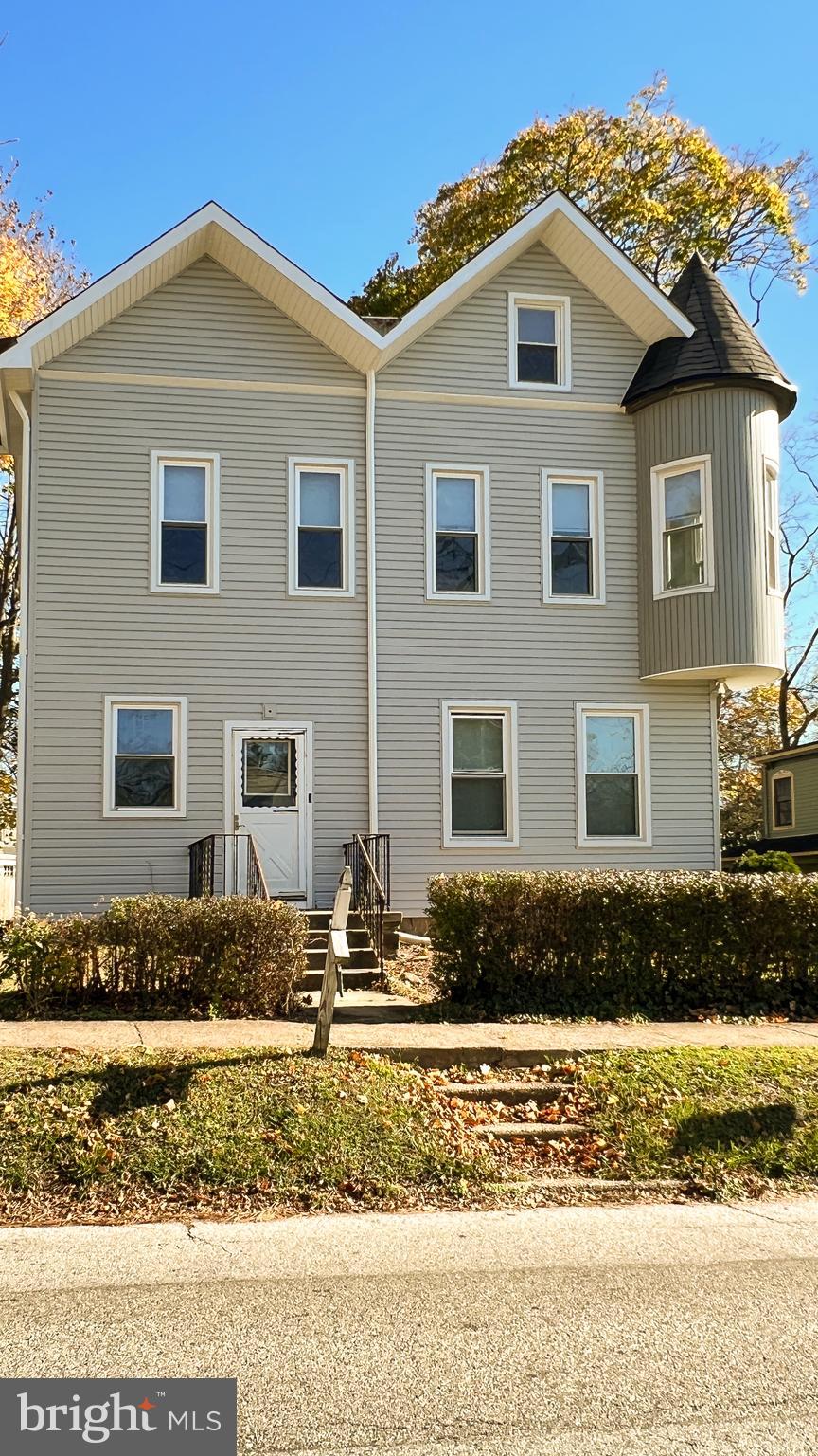 This charming newly-renovated PET-FRIENDLY large 1BD is on the 1st floor of a Victorian Triplex. The living room boasts 10' ceilings, newly-refinished hardwood floors, a seating area w/bench seat and windows on 3 sides, a ceiling fan, and floor-to-ceiling pocket doors separating it from the large bedroom if you choose. The bedroom also has a 10' ceiling, h/w floors, three large windows with decorative vertical blinds, a ceiling fan, and a floor-to-ceiling closet. The bathroom features a bathtub and shower with new shower doors, 10' ceilings, a large window and a new toilet and vanity. The vinyl plank floor in the kitchen & bath is new. The nice-sized eat-in kitchen is all new, and features 10' ceilings, a large refrigerator, a brand new gas stove, new microwave and lots of kitchen cabinets. There is also a ceiling fan. There is a private entrance with a beautiful porch. The apartment features large radiators which provide plenty of heat. This apartment has inside access to the basement for storage and laundry. Off-street parking, includes heat, hot water, laundry! Seconds from the train, Elkins Perk, Creekside Food and Tap, Sicilian Trattoria, Ashbourne Cleaners, Franks Pizza and more! A must see!