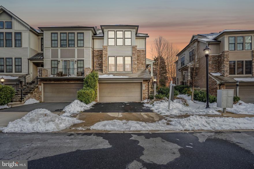 **Multiple offers received.  Seller is asking for highest and best by 2:00PM on Monday 01/29/2024**  
Welcome to this exquisite 3 bedroom/3.5 baths/2-car garage, three-level end-unit townhome, bathed in sunlight and adorned with luxurious appointments.  Boasting approximately 3800 square feet of meticulously finished space and delightful outdoor living areas, this residence is a true gem. The main level, featuring 10’ ceilings and walls of windows on three sides, unveils an open floor plan with a generous family room featuring a gas fireplace and stone surround. The dramatic sliding glass doors lead to a charming screened porch, complementing the spacious kitchen equipped with soft-close cabinetry, a massive island, and a separate dining area. Additionally, a perfectly sized living room or home office completes this inviting space.  Ascend to the upper level, where a large primary suite awaits with a vaulted ceiling, two walk-in closets, and a lavish bath featuring an extra-large shower, dual sink vanity, and a separate water closet.  Two additional bedrooms, a full bath, a bonus area that can easily be converted to a 4th bedroom, and a conveniently located laundry room round out this level.  The lower level adorned with 9’ ceilings and recessed lighting, serves as the ultimate entertainment hub. Offering an expansive recreation room, a full bath, storage rooms, and a walkup leading to a fully fenced yard, this space is perfect for relaxation and gatherings.  
Ideally situated within the development within walking distance to the outdoor pool, trails, parks, schools, and Brambleton Town Center. For commuters, the location is a dream, providing easy access to Loudoun County Parkway, Dulles Greenway, Route 50, Route 28, and the new Silver Line Metro Station. This home is perfect and ready for you to savor every moment!