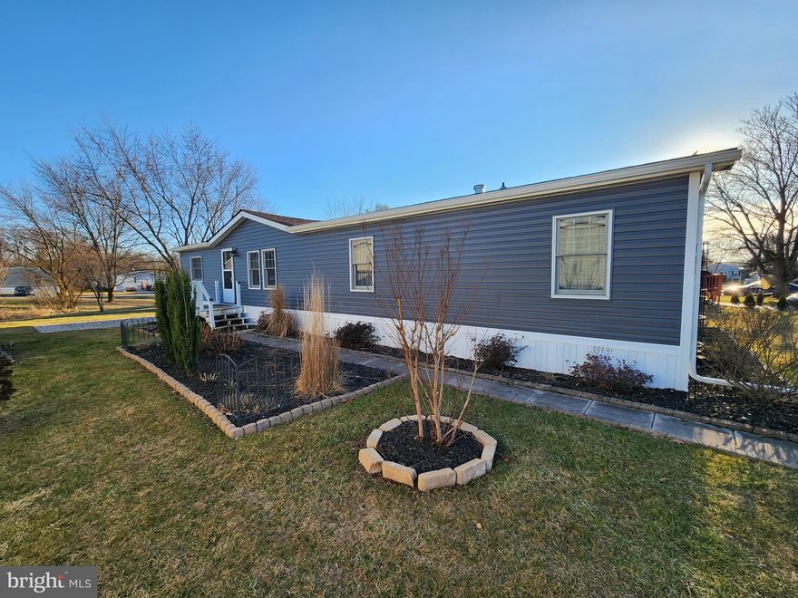 Well maintained manufactured home in beautiful Grantville Commons.  3 bedroom, 2 bath, living room with gel fireplace and family room with electric fireplace. Exterior has been upgraded with new siding and lots of flowerbeds just waiting for spring to bloom.  All appliances and shed included. Come take a look, at this price it wont last long.