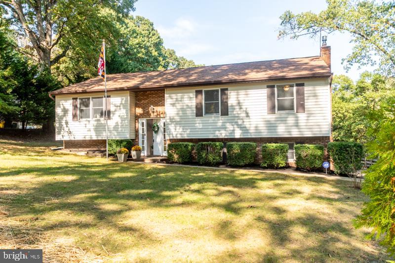 Open Houses: Sat 10/19 and Sun 10/20, 1-3 PM. -- SEVERNA PARK SCHOOLS!!! NEW! NEW! NEW! TURNKEY RENOVATION ready for you!! The large dream kitchen will wow you with quartz countertops, black stainless appliances, a spacious island, shaker cabinets, and sleek black fixtures. But wait, the garage is incredible too—12 ft tall, 15 ft wide door, perfect for your RV, with a mechanic’s pit. Plus, there are two oversized sheds for all your storage needs! Huge parking pad with electric hookup, ideal for your camper. Inside, enjoy 3 bedrooms, 2.5 baths, and a bright, airy layout with recessed lighting and lots of natural light. The primary bedroom boasts an ensuite bathroom. Off the kitchen, the sunroom offers lots of windows and natural light—great for relaxing or as a versatile space for work, hobbies, or play. The lower level features a spacious additional living area with a newer gas Enviro stove, plus a bathroom and a room that’s ideal for an office, crafts, or whatever you need. There’s also extra storage and even the potential for a workshop. Step outside to over half an acre of stunning, private paradise! The lot is beautiful, tranquil, and feels like your own peaceful retreat—excellent for relaxing or entertaining. Love the outdoors? Kinder Farm Park is practically your other backyard—just minutes away! B & A Bike Trail only a block away! Recently resealed driveway, well & septic, with future access to public water. No HOA—enjoy the freedom to make the space your own! HVAC 2019, water heater 2017. Cinch Preferred Home Warranty included. IMPORTANT! For Directions: Your GPS will require to use THIS address: 22 W. Pasadena Rd (MILLERSVILLE).