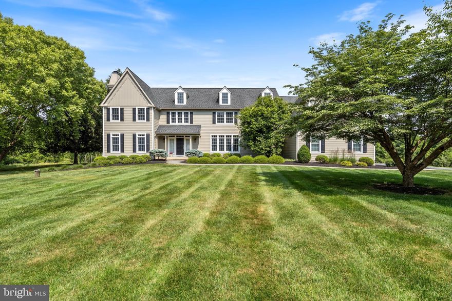 If you are looking for a quiet oasis nestled in the hills of Chester County, this just might be the home for you.  An end of cul-de-sac, Folly Hill setting in the UNIONVILLE CHADDS FORD SCHOOL DISTRICT, on  a  4 acre lot.  With a beautiful in-ground pool, finished lower level,  and the extra acreage, there is room for every kind of recreational activity.  The 2 story entry hall with soaring  staircase gives a clue to the gracious proportions of this home.  The formal living room and dining room are perfect for holiday decorating and entertaining.  The chef  won’t be disappointed with the gourmet kitchen that was gutted in 2015 and totally renovated with high end appliances including: 5 burner propane gas cook top; two Wolf wall ovens; subzero refrigerator; wine cooler; Ako dishwaher; Jennaire ice maker;cherry cabinets; and a huge granite island with stool overhang and bar sink.    Since its large informal eating area is open to the family room and that has a door to access the covered porch and swimming pool, it has a perfect flow pattern for less formal gatherings. Access the office from the family room or entry hall, but there are doors on each to insure privacy when you are working. Use the front  or back stairs to reach the second level. Enjoy the primary bedroom with high ceiling and a walk in closet with wood drawers and organizers. Luxuriate in the Koher air tub, or opt for a stimulating shower with the rain shower head, a hand held,  and 3 other wall showers. Never have cold feet because you step out onto the radiant heated floor. With 4 more bedrooms, ( one of which is a modified princess),  and 2 more baths on this level there is plenty of room for family and guests. The lower level is finished with lots of space for games, gym, or hobbies.  Eyebrow windows provide natural light. Relax on the covered porch and enjoy the serenity of the pool and gardens, which are backed by a tree lined open space. Enjoy fresh produce from the fenced in vegetable  garden. The 3 car side entry garage will protect your vehicles. In 2022 owners had the exterior stucco removed and replaced with Hardie plank, as well as installing  56 windows with Anderson series 400. Be in by school start!
