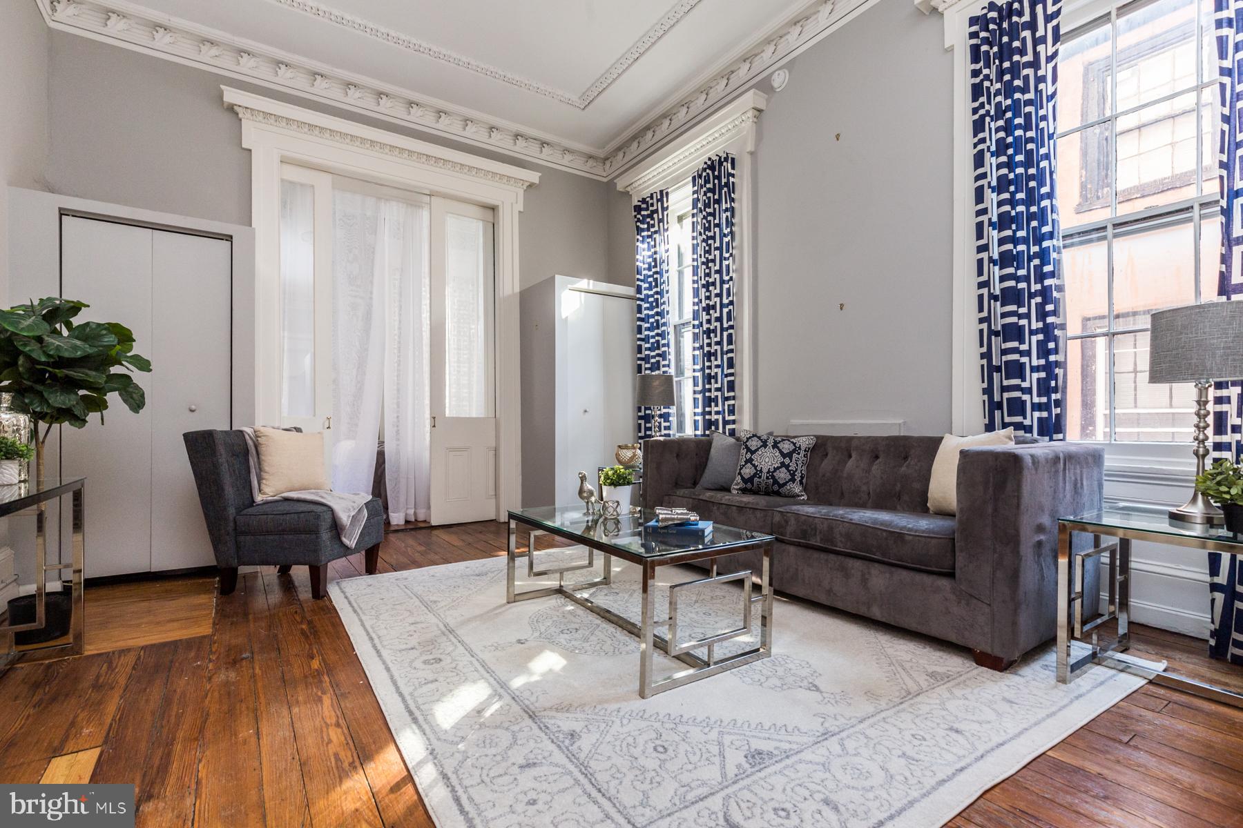 Available early June | Leasing Special: $1,695/month for a 12 month lease; or $1,650/month for a 24month lease.
Welcome to 1717 Spruce St #2R! This beautiful 1 bedroom / 1 bathroom apartment boasts charming character and historic details that are sure to impress! Features include high ceilings, hardwood floors, original woodworking and crown molding, huge windows, and an incredibly rare large private deck! Enter into a hallway with the kitchen on your right and the living area straight head. Kitchen features include cabinetry above and below, dishwasher, gas range, refrigerator, and a lovely pass through bar area. Head into the living room offering tall windows and a marble fireplace. Your full bathroom boasts tile flooring, tiled tub with showerhead, vanity with additional storage space, and a linen closet. At the back of the apartment you can find your bright bedroom and access to your private deck – great for those warmer months! The building offers coin-operated laundry facilities and private storage in the basement. Schedule your tour today!
About The Neighborhood:
Located just around the corner from Rittenhouse Square – you’ll have plenty of options for dining, shopping, and entertainment. A short walk to Broad Street’s Avenue of the Arts offering concert halls and museums. Surrounded by fantastic local favorites like Parc, Rival Bros, Federal Donuts, Metropolitan Cafe, La Colombe, Barclay Prime, and countless more!
Lease Terms:
Generally, first month, last month, and one month security deposit due at, or prior to, lease signing. Other terms may be required by Landlord. $55 application fee per applicant. Strictly no pets. Tenants responsible for: electricity, gas, cable/internet, and a $35/month flat water fee.