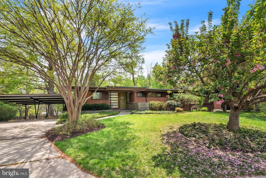 A timeless classic, reimagined for modern living.

Tucked away at the end of a peaceful cul-de-sac, this rarely offered midcentury modern gem offers a level of privacy and charm that is hard to find in Chevy Chase. Set on over 15,000 square feet of land, the property blends iconic design with thoughtful updates—classic architecture, elevated by every modern convenience.

Ready for an inaugural tenant, the home, built in 1954 and fully renovated in 2015, honors its original character while providing all the comfort and function of contemporary living. Step inside to a bright, open-concept living space where the living, dining, and stunning skylit kitchen flow seamlessly together—perfect for everyday life and entertaining.

Oversized windows, a spacious main-level deck, and multiple skylights flood the home with light, while features like a laundry chute, two sets of washer/dryers, and a backup generator make this home as practical as it is stylish.

The primary suite is a luxurious retreat, featuring dual walk-in closets and a spa-inspired bathroom. Two additional bedrooms and a full bath on the main floor are perfect for family, guests, or flexible living. The expansive lower level offers three more bedrooms, a full bath, a generous living area with fireplace, a wet bar for entertaining, and a private entrance to one of the bedrooms—ideal for an au pair, in-law suite, or private office.

With the convenient carport, inviting fire pit, heated screened-in patio for year-round use, and generous lot perched above the neighborhood, this home feels like a hidden retreat—larger than it appears from the street and full of character at every turn.  Landscaping services are included in this offering.

This home is zoned to the highly sought-after Bethesda-Chevy Chase High School pyramid, renowned for its International Baccalaureate (IB) Diploma Program—a world-class educational opportunity right in your neighborhood.