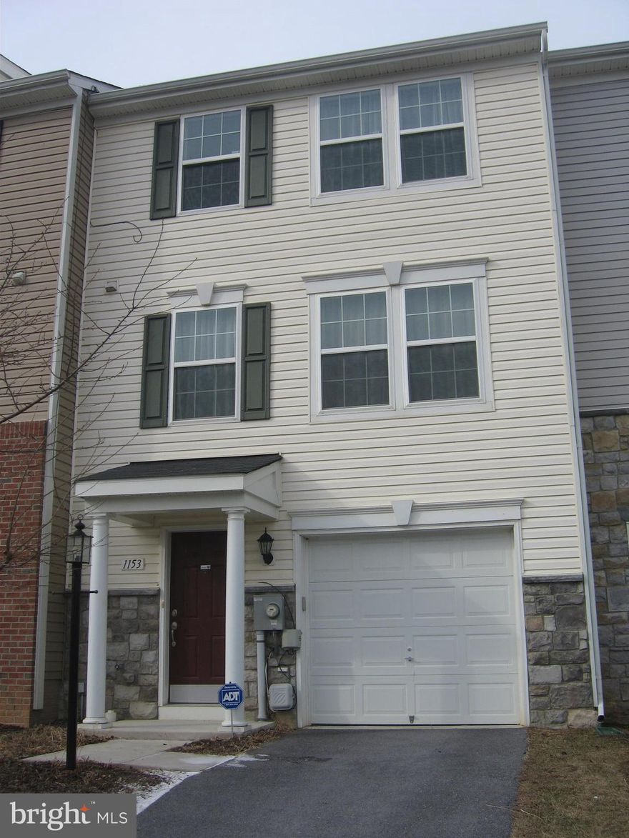 Well appointed/maintained/located easy low maintenance living. All three levels finished. Excellent commuter location, close to shopping. Open Living Room/Kitchen. Ample Cherry cabinets, kitchen island. Finished walk-out basement with 1/2 Bath makes an excellent professional office. Master Bedroom/Bath/Walk-in Closet/Double Vanities. One car garage/opener/remote.