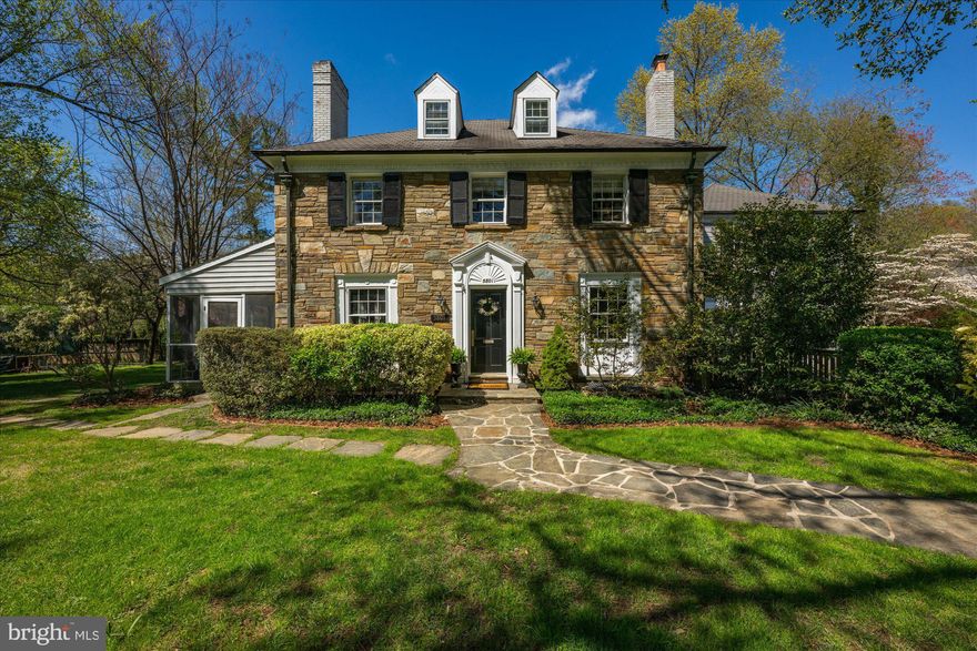 Step into timeless charm with this beautifully crafted stone and brick colonial, where character meets comfort.  Nestled on a BIG double lot (.38 acres) with lush landscaping  just minutes from downtown Bethesda, this home offers a magical outdoor space perfect for making memories- complete with a tree swing and a whimsical treehouse tucked under shady branches.   Whether you are entertaining in the spacious backyard or enjoying quiet mornings on the porch, this home invites you to slow down and savor the moment.  With hardwood floors flowing seamlessly throughout, the home boasts spacious, sun-drenched living areas, creating a welcoming and comfortable atmosphere. The elegant dining room and living room offer a refined space for formal gatherings, while the family room, with its soaring vaulted & beamed ceilings and skylights, is a cozy retreat that opens directly to a private patio and a fully fenced yard.  The open kitchen features granite countertops, high-end stainless steel appliances, and ample cabinetry, ideal for both everyday meals and entertaining guests. A well-designed mudroom provides convenience and organization, while the 2+ car garage offers plenty of space for vehicles and additional storage. The lower level is a versatile space, ideal for guests or an au-pair suite, featuring a large rec room, a separate den, a full bathroom, a bonus/exercise room and an abundance of storage options. Upstairs, the generous bedrooms offer comfort and privacy, with the spacious primary suite serving as a tranquil escape. The suite includes two walk-in closets and a beautifully appointed, renovated  bathroom. Outside, the large, flat, private  yard is a dream making it the perfect setting for children to play, for hosting gatherings with friends and family or an open palette for the home gardener. This home provides an exceptional opportunity for both entertaining and everyday living, with a layout that flows effortlessly from room to room and from indoor to outdoor spaces. With its prime location just minutes from the best that Bethesda has to offer—including the Metro,  NIH, Suburban Hospital, local shops, restaurants, and parks—this property truly has it all. And with its coveted placement in the Walt Whitman High School cluster, this home is an opportunity not to be missed.  Come see it today!