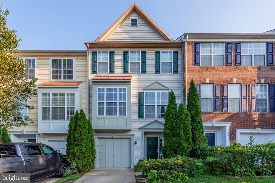 Welcome to a terrific 1 car garage townhome in the heart of Woodbridge. At entrance you will feel the wide-open floor plan pulling you in as you step into warm hardwood floors. The lower level features an entrance to the garage a large rec-room with all new carpets, a recently remodeled half bathroom and a walk-out door to the fenced in back yard. The main level is directly out of a magazine, with its high ceilings, continuation of hardwood floors and large windows you have a bright and airy space. The kitchen has exactly what we are all looking for with its white cabinets, quartz counter tops and stainless steel appliances and modern grey flooring you will be definitely be cooking in style. On the owners level you will immediately notice the lack of carpet that has been replaced with a continuation of the hardwood floors from the main level. The master suite provides a modern feel  with its high vaulted ceilings, large walk-in closet and tons of natural light. The master bathroom has been upgraded with a upscale double sink vanity, new tile floors, glass surround shower and even an upgraded toilet. The junior suites carry on the theme of elegance with the hardwood floors and modern grey walls.