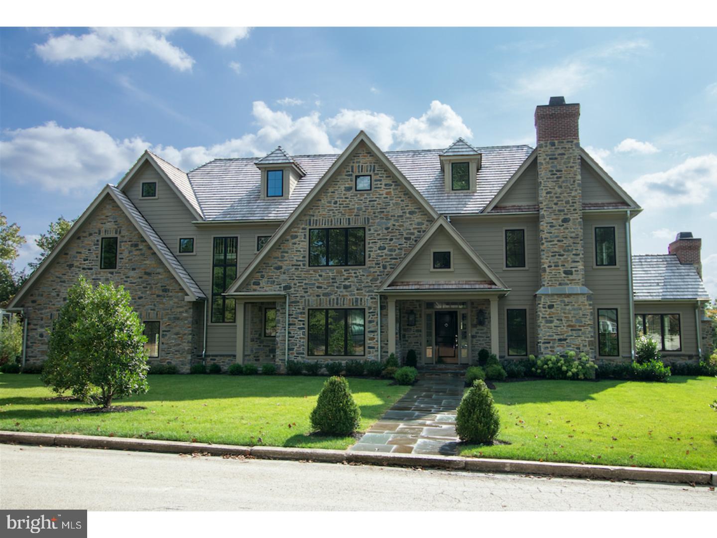 Welcome to the the best value in Philadelphia! We are proud to present this handsome custom stone residence, situated on just over half an acre on a quiet street in a favorite Chestnut Hill location. A short walk to the village shopping, restaurants, train, and the coveted Wissahickon trails. Blake Development is committed to the highest quality standard features including Wissahickon schist and James Hardie board exterior, hand split cedar shake roof, 9 ft ceilings, hardwood floors, custom millwork and cabinetry. Enter a gracious center hallway. The first floor offers formal living and dining rooms, family room, library with vaulted ceiling, stone details and barn beams. Gourmet kitchen outfitted with SubZero and Wolf appliances, quartzite countertops, breakfast area, mudroom, and French doors opening to a flagstone terrace. Second floor is a generous floorplan including a master bedroom suite, four additional bedrooms, three baths, laundry room and plenty of closet space. Third floor bonus room with full bath and lots of storage. A 2000 sqft finished lower level with full bath/shower, lots of spaces for exercise, media and game rooms, and a walk-out to rear yard. Three car garage. Extensive, mature landscape plan by Mary Costello and a 10 year real estate tax abatement. This house is a knockout! The finest new construction you have come to expect from one of Philadelphia's premier custom builders.