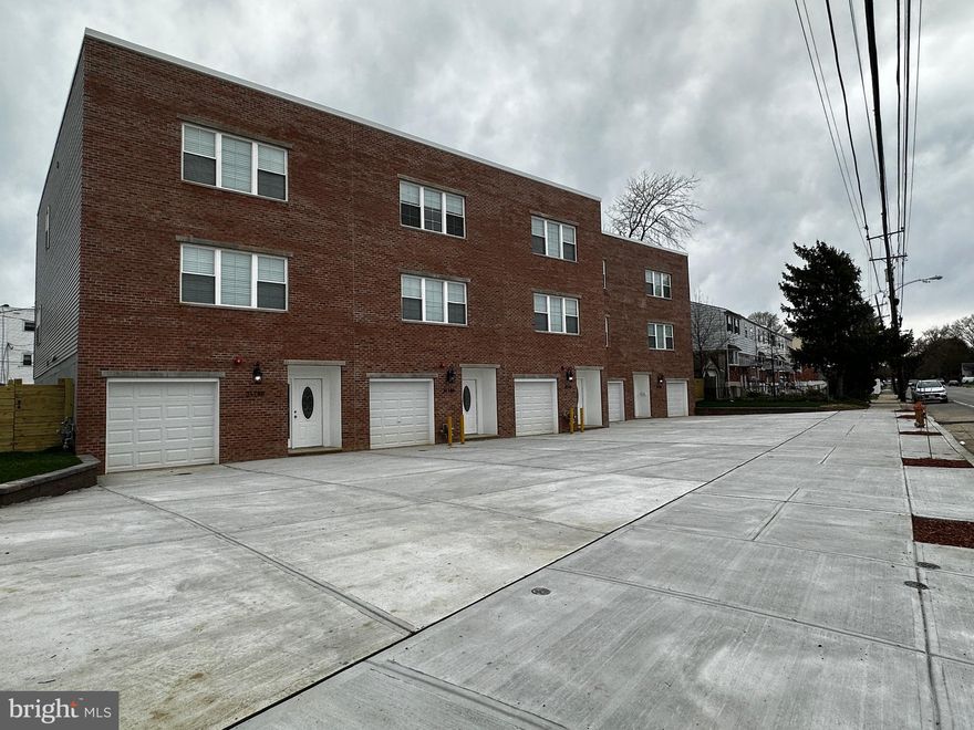 New construction on the heart of Park Wood Northeast Philadelphia.  5 New Row Homes. Property Convenient To Shopping Mall, School and Transportation, Wawa and Golf Galaxy in coming... First Floor of the Ground level with long driveway could park up to 2 cars. and full basement with build in attached garage. Hardwood floor through-out 2nd and 3rd Floor. Open kitchen concept. 3 nice size bedrooms with 2.5 bath. 2 full bath come with jacuzzi tubs. 2 zones HVAC System.