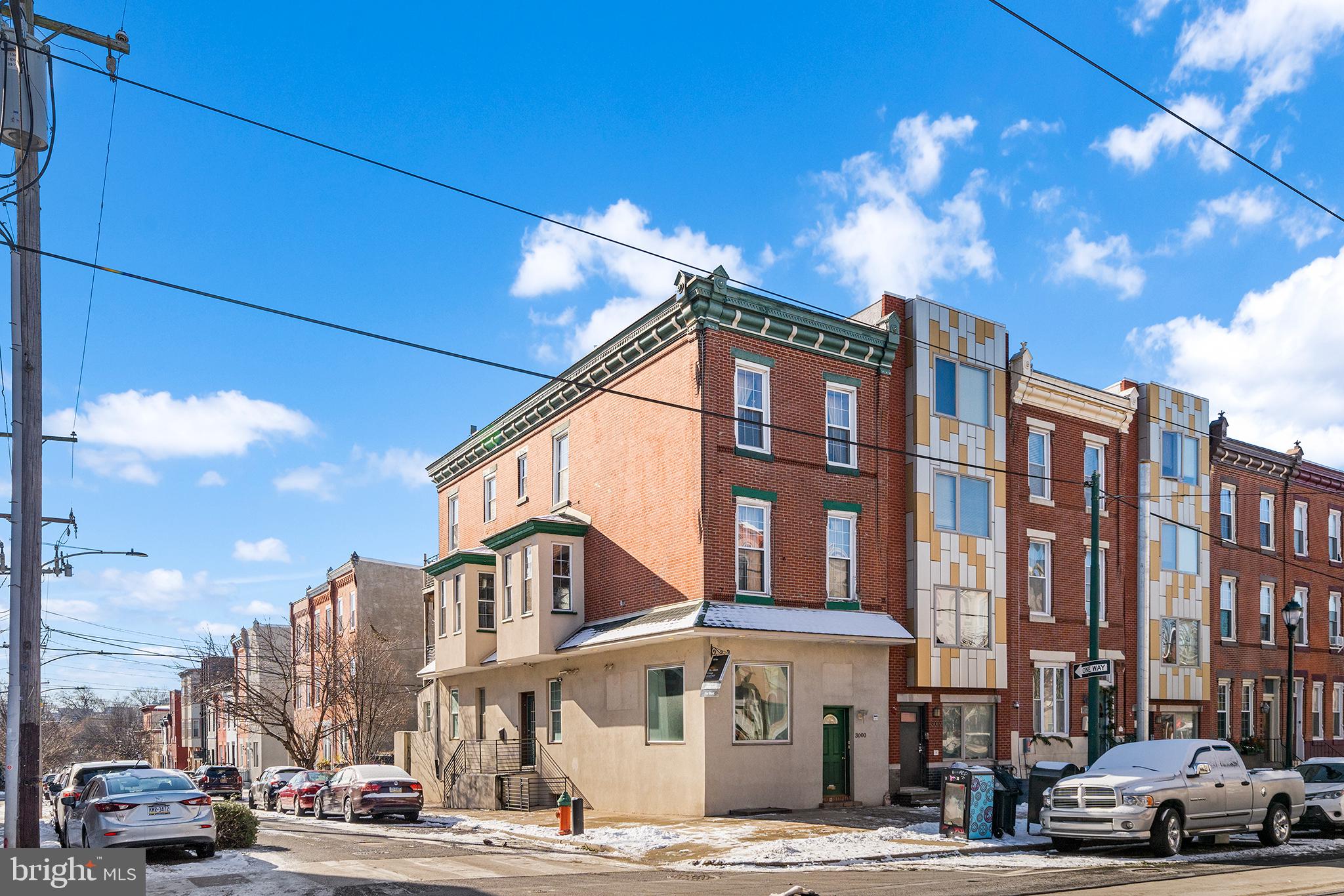 Welcome to this exceptional 3-story, multi-family corner property nestled in the vibrant heart of Fairmount. Offering a mix of charm and modern updates, this unique gem presents endless possibilities for investors and owner-occupiers alike. The 1st Floor Commercial Space has been recently renovated with a modern open layout, kitchenette, and powder room, this space is ideal for retail, office, healthcare or your creative endeavors. Additional finished space is located in the basement along with a kitchenette, full bathroom, and utility room.
The 2nd fl rental unit is a chic 2-bedroom, 1-bath unit which boasts exposed brick walls, recessed lighting, and an open floor plan. This unit benefits from two additional bump outs and a private outdoor deck.
The 3rd Fl Unit featuring two spacious bedrooms, one bath, and breathtaking Center City skyline views, this unit is a renter’s dream. This unit also includes a skylight and open staircase. The two apartments share a private entrance which also includes a coin operated washer and dryer. Situated in Fairmount, one of Philadelphia's most sought-after neighborhoods, 3000 Girard Ave is just steps away from world-class museums, cafes, restaurants, and public transportation. This property combines character, convenience, and versatility in one incredible package. Whether you're envisioning income-generating rentals, a live-work setup, or a standout addition to your portfolio, 3000 Girard Ave is the ultimate investment opportunity. Don’t miss your chance to own this Fairmount gem!
Remainder of the 10 year Tax Abatement!!