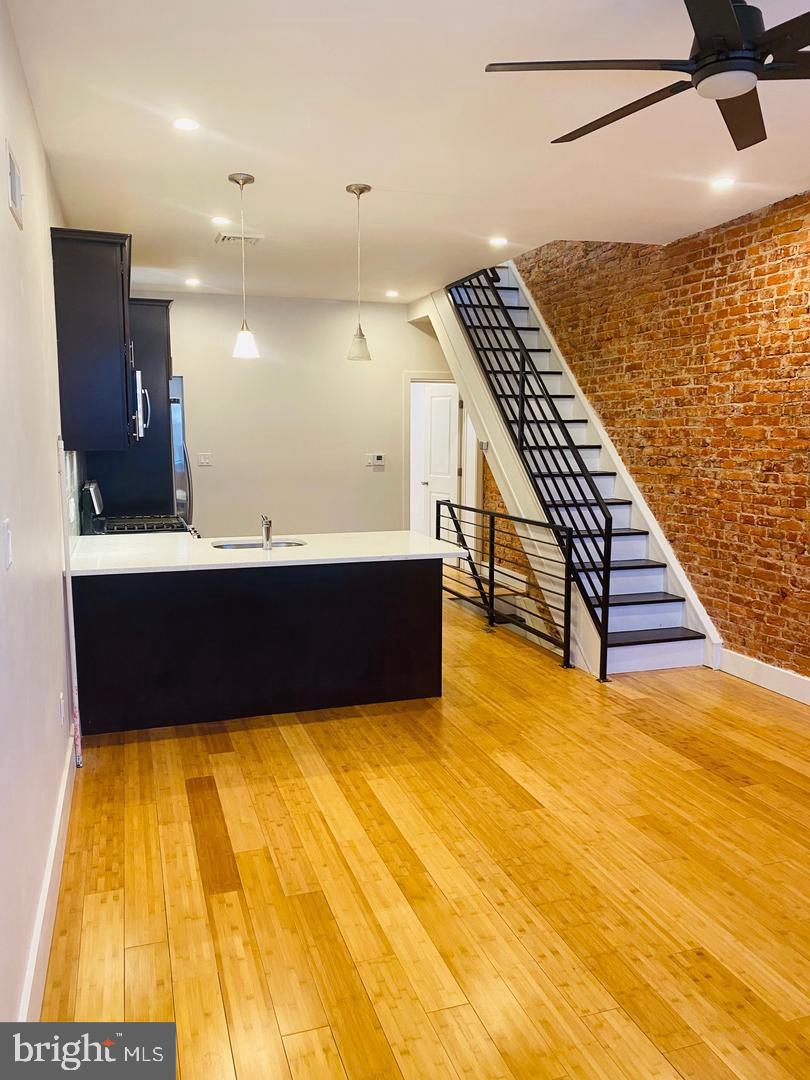 This beautifully updated 4-bedroom, 2-bathroom home seamlessly combines modern convenience with timeless charm. Upon entering, you’ll be greeted by a spacious living area highlighted by stunning exposed brick, adding warmth and character to the space. The open-concept peninsula kitchen is thoughtfully designed with a stainless steel appliance suite, sleek cabinetry, and ample counter space, making it perfect for both cooking and entertaining.
Adjacent to the kitchen, direct access to a private patio provides the perfect setting for outdoor dining, morning coffee, or simply unwinding.
The fully finished basement expands the home’s versatility, offering additional living space along with a dedicated laundry area. This space can be transformed to fit your needs, whether as a home office, gym, or media room.
Upstairs, sunlit bedrooms provide generous storage and a comfortable retreat. Throughout the home, gleaming hardwood floors enhance the aesthetic, while central air ensures comfort in every season.
Don't miss out on this incredible opportunity—schedule your showing today!