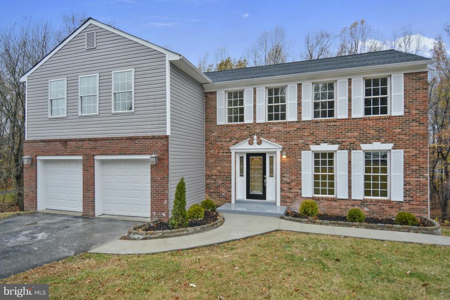 Just Reduced!  Completely renovated contemporary home containing 4 spacious bedrooms, 3 full baths, 2 half baths and a fully finished basement. This pearl is adorned with hardwood floors, high end appliances and granite counter tops. The master suite is simply awesome, to include a dreamy master bath and nicely designed walk-in closet.  Owner is highly motivated.