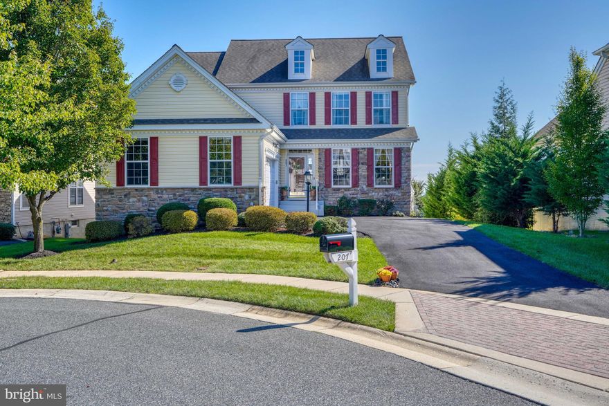 This meticulously maintained home is waiting for its new owner.  Its properly listed under appraised value. 
 and located  in the resort like community of Bulle Rock, where life imitates vacation.  This detached colonial home features over 4000 square feet of living space including 4 bedrooms and 2 offices that could be used as additional bedrooms if needed.   Enter into an open concept living and dining rooms, featuring a two story foyer, crown molding, chair rail and recessed lighting.  You'll be drawn in by the sunlight from the large kitchen with its granite counter tops and high-end stainless steel appliance package, spacious pantry and generously sized breakfast area.  This room opens to the family room that has 12' ceilings, gas fireplace and sliders to the deck where you'll catch a glimpse of the Chesapeake Bay.  The first floor primary bedroom offers more views of the Bay and has his-and-her custom walk-in closets, oversized bath with dual vanities, jetted tub and separate shower.  The laundry/mudroom and powder room complete the first floor.  Going to the upper level you'll find an additional light-filled sitting area, 3 additional bedrooms, including a second large primary suite with its own private bath and walk-in closet, and one hall bathroom with dual sinks The huge lower level is an entertainer's paradise, with wet bar, two lounge areas, recreation area, custom wine storage, home gym, fifth bedroom with  full bath and sliders leading to the newly expanded patio with a lighted retaining/seating wall.  A large storage/utility area with a brand new HVAC system completes the lower level.  You must experience this one in person, the pictures do not do it justice.  Buyers may want to take advantage of the current assumable loan at 3.375 fixed rate.