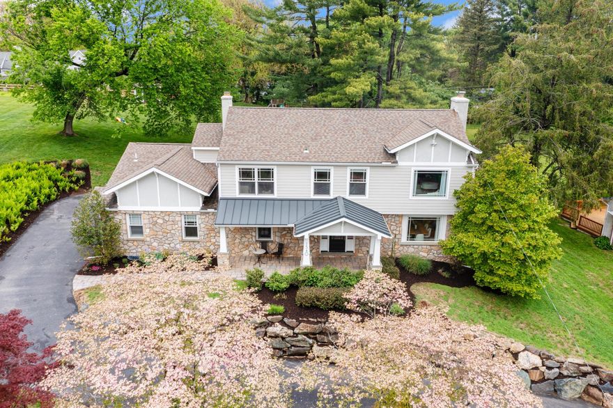 If you’ve been waiting all spring for the perfect home, this is it! This exquisite residence, completely renovated and expanded in 2017 and thoughtfully enhanced again in 2023 by the current owners, offers a seamless blend of luxury, comfort, and modern design. Spanning approximately 3,791 square feet, the home showcases meticulous attention to detail, high-end finishes, and a layout designed for both everyday living and effortless entertaining. The home’s bright, modern interior was designed by the local design firm Far Studio, bringing a cohesive and elevated aesthetic throughout.
Step inside to an inviting open floor plan that connects the family room and gourmet kitchen, creating the true heart of the home. The kitchen is a chef’s dream, featuring a Thermador six-burner gas cooktop, Poggen Pohl cabinetry, Wolf microwave/convection and wall oven, a double door Fisher & Paykel refrigerator with freezer drawer, and a spacious island with quartz countertops. A custom dry bar area was added to the kitchen dining space, enhancing both functionality and style. Hardwood flooring flows throughout the home, adding warmth and sophistication.
The formal dining room provides an inviting and elegant setting for gatherings, complete with a wood-burning fireplace that adds character and charm. A cozy sitting area completes this space. The family room, anchored by a gas fireplace with an updated fluted surround, offers a comfortable and refined space for everyday living. A first-floor office and playroom add flexibility to suit a variety of lifestyles.
Upstairs, the primary suite with coffered ceilings serves as a true retreat, offering ample storage and luxurious finishes. The master bath features a frameless shower, soaking tub and double sinks with custom cabinetry. Three additional generously sized bedrooms provide comfort and privacy. Two share a well-appointed hall bath with marble countertops, while the third features an ensuite bath, ideal for guests or an au pair, along with adjacent flex space currently used as a playroom.
The finished lower level expands the home’s functionality with a dedicated home gym and wine storage, creating spaces tailored for both wellness and entertaining.
Outside, the property is equally impressive. The family room opens to a wood deck and beautiful stone patio. Extensive hardscaping with beautiful stone retaining walls pair with planting beds, and enhanced landscaping to create a beautifully curated outdoor setting. The front and rear yards offer a serene backdrop for relaxation and entertaining, complemented by panoramic views that provide a picturesque setting for morning coffee or evening sunsets.
Additional highlights include a main floor laundry room, a side-entry attached two-car garage, and a security system for added peace of mind.
With two significant renovation phases, the first completed in 2017 by the previous owner, including many upgrades including the kitchen, bathrooms, and new roof, and the second in 2023 refining the home’s design and livability, this property offers a rare opportunity to own a truly move-in ready home where every detail has been thoughtfully considered.
This is more than a home. It is a lifestyle, designed for comfort, beauty, and lasting memories.