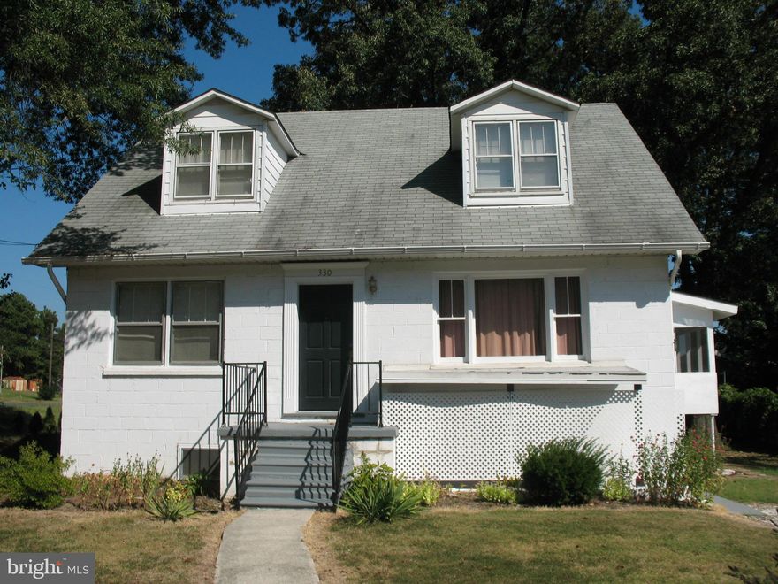 PROPERTY IS WINTERIZED. UNABLE TO USE TOILETS. Possibilities! Live on main floor& rent upper. (separate entrances).  Bright, Airy Home set back on 1/2 acre, corner lot. HVAC w/new duct work. Upgraded Electrical! Beautiful hardwood floors under carpets, updated kitchen, screened porch, gutter helmets. No HOA, Prime Location -near BW Medical Center, County Gov't & Major Routes- 695,97,100.