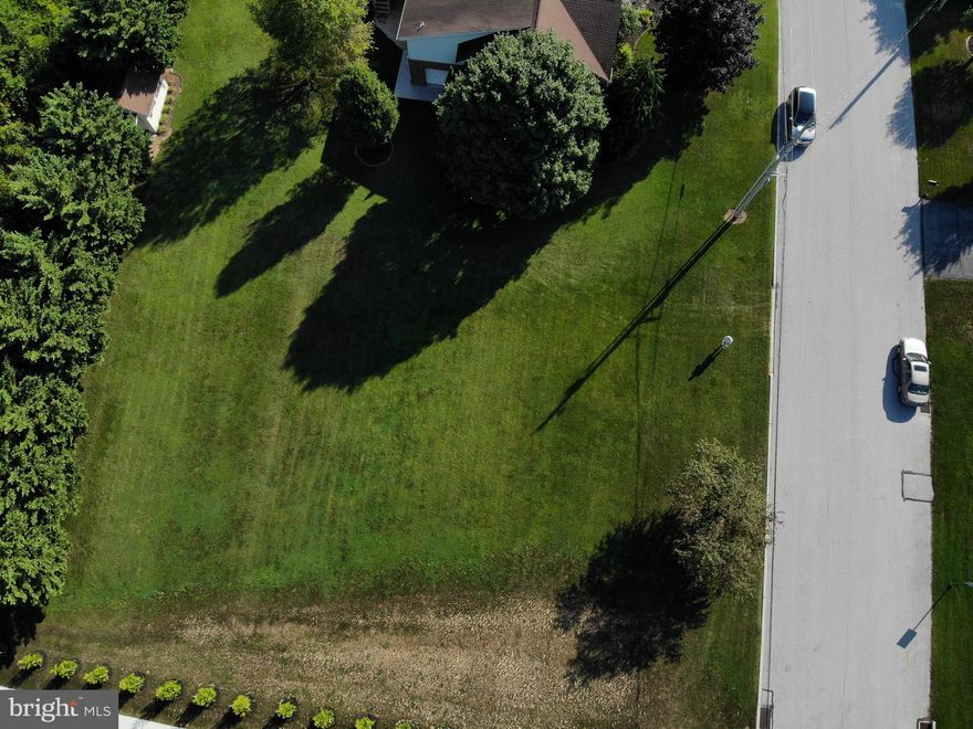 Corner Building Lot - Approx 1/2 Acre - In Town- Easy access to Maryland - Public Utilities