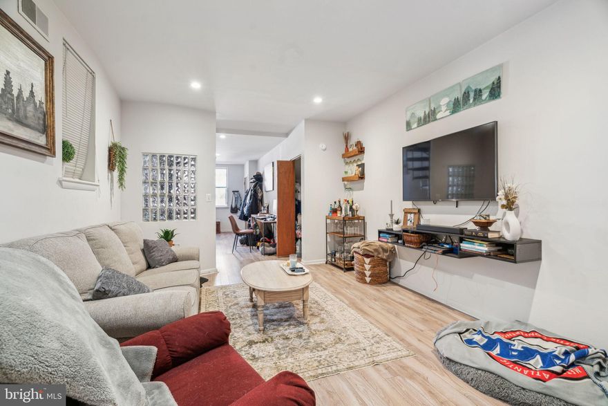 Beautifully remodeled apartment! Complete kitchen re-do with brand new stainless steel appliances, a new quartz countertop, new sink and faucet. The half bath on the first floor has a new floor and vanity sink. The inviting backyard has been repaved and painted. This wonderful apartment is on the ground floor of a lovely block in beautiful Queen Village. The first floor features a large, open, living space with wood laminate flooring, a half bath, double windows, a dining area, an eat-in kitchen, in-unit laundry, and a private patio. Up the spiral stairs is a large bedroom and a recently renovated full bath. There is abundant storage space in the basement.In addition, the beautiful two-bedroom unit upstairs is also for rent. A great opportunity for friends/family to live in the same building! Also eligible for parking in the Queen Village neighbor's parking lot at the corner of Front St and Christian! Walk Score 98, public transit 75, bike 82! Shops and restaurants are steps away. It's a short walk to the waterfront, Penn's Landing, Headhouse Farmers' Market, and it's in the Meredith catchment!