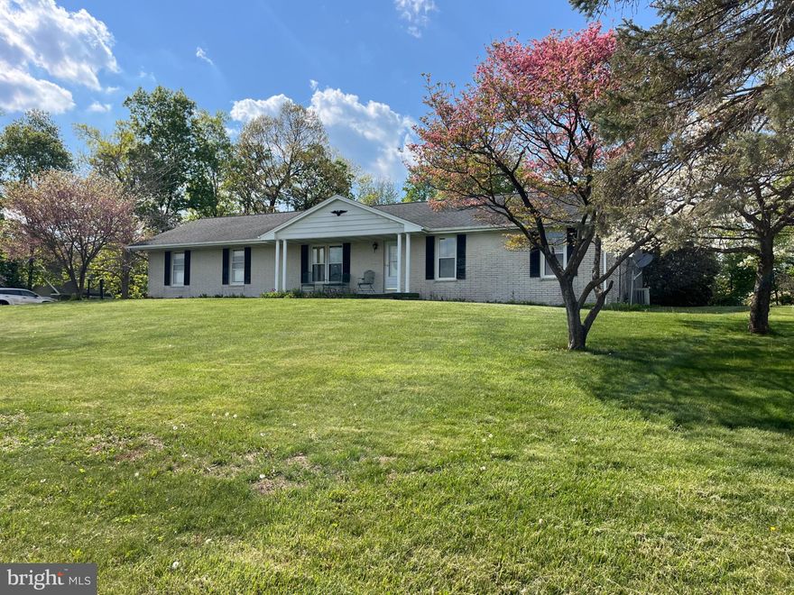 This charming ranch-style home, built in 1972, offers a perfect blend of comfort and functionality. With three spacious bedrooms and a full bathroom featuring a tub shower, it's designed for easy living. The heart of the home is a cozy combination kitchen and dining area, complete with appliances including an electric oven/range and refrigerator. Enjoy the warmth of the wood stove and the inviting ambiance created by hardwood floors throughout. Step outside to a scenic vista, where a generous 2.67-acre lot provides ample space for outdoor activities. The partially finished basement offers potential for additional living space, while the attached garage and driveway accommodate plenty of parking. Local schools and public services are easily accessible, enhancing the convenience of daily life. Experience the comfort and charm of this delightful property, where every detail invites you to make it your own. Estate sale being offered as is.