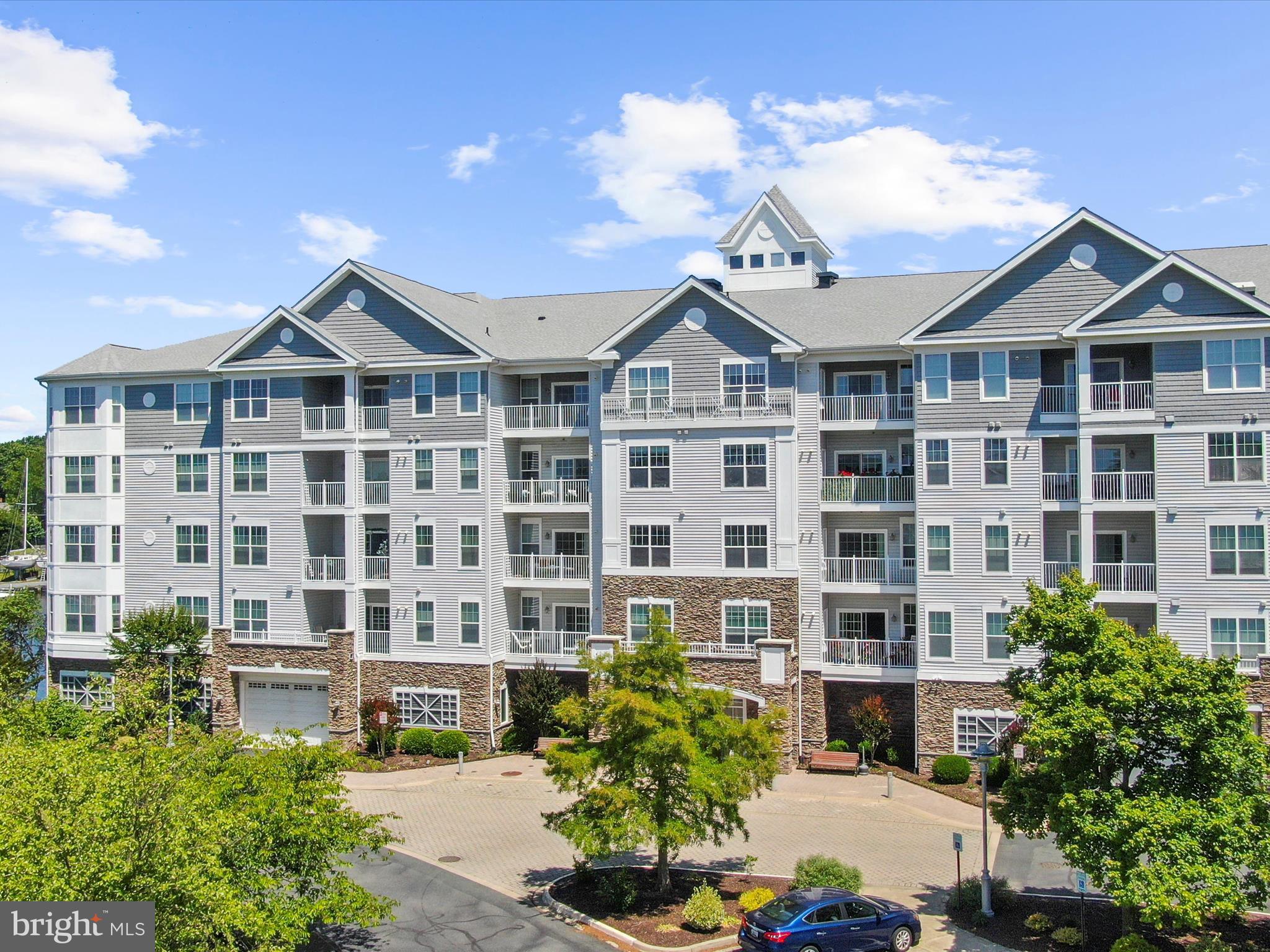 Discover serene, low-maintenance living in this beautifully updated 2-bedroom, 2-bathroom condo at Deep Harbour, a premier waterfront community nestled along Cambridge Creek in downtown Cambridge, MD. This residence offers a harmonious blend of modern elegance and coastal charm, perfect for those seeking a tranquil retreat with convenient access to local amenities.
Spacious & Thoughtfully Designed: Boasting 1,579 sq. ft. of open-concept living space, this home features gleaming wood floors, recessed lighting, crown molding, and a neutral color palette that complements any décor.
Private Balcony: Enjoy morning coffee or evening sunsets on your private balcony, offering views of Cambridge Creek and the surrounding waterfront.