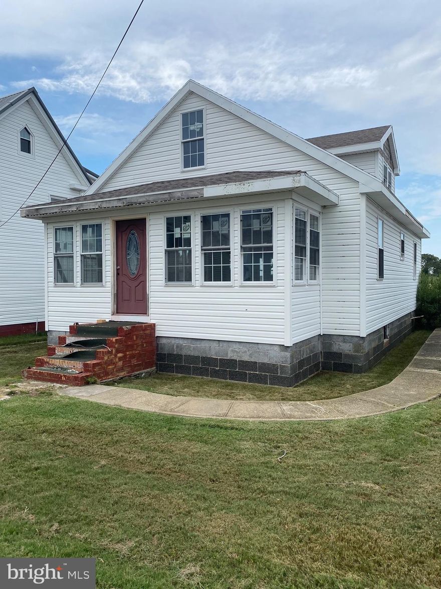 This cozy little island cottage is located on the water in the village of Ewell, Smith Island, Maryland. The roof, vinyl siding and all windows and doors have been replaced. The inside has been opened up and completely gutted to maximize space. It is situated on a quiet street, right on the water with views of all boat traffic coming and leaving the island. There is a deep water dock and small platform conveniently located just behind the house. Home is being sold As Is. This property shouldn’t be available for long, as there is a high demand for properties located directly on the water with a dock.