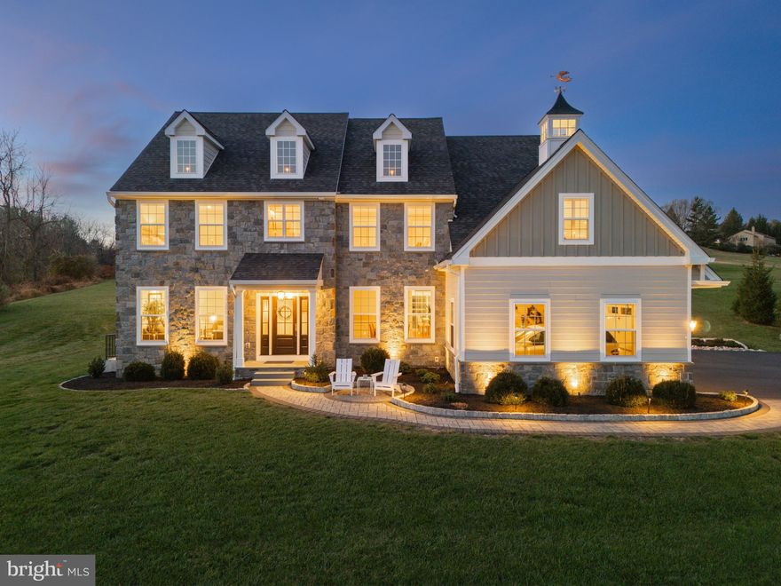 Welcome to 925 Lenape Rd! A meticulously maintained and move-in ready masterpiece that defines the epitome of modern luxury living.  Positioned atop a gentle rise, this residence graces a picturesque hillside on its 3.2-acre private homesite, offering both commanding views and a heightened sense of elegance. As you step through the front door, you'll be captivated by the seamless flow of the open floor plan, perfectly complemented by the warmth of the extensive millwork and tasteful upgrades found throughout the home. The attention to detail is evident in every corner, showcasing the home's impeccable condition. Upgraded features include: Low maintenance stone front, Hardy plank siding and Azek exterior trim package. A solid Provia front door with glass. Site finished hardwood floor throughout the main level and 2nd floor hall. Gourmet kitchen where pristine white cabinetry extends to the ceiling, adorned with glass tops for a touch of sophistication. A Bosch appliance package, featuring a 5-burner gas cooktop, double oven, and dishwasher. Quartz counters grace the expansive surfaces including an oversized kitchen island with overhang for seating. The spacious 2 story family room off of the kitchen features a gas fireplace and wall of windows with battery operated shades.  Upstairs the master suite offers a volume tray ceiling, sitting room with extra insulation, and walk in closets designed by Closets By Design. The luxurious master bath is finished with marble floors and shower walls, free standing tub, oversized shower, and his and hers vanities. The secondary bedrooms all have private bath access, cast iron tubs, and closets designed by Closets By Design. The lower level is finished with an outside entrance and includes two large living areas ideal for second family room and game room. Additional powder room. Two additional storage areas.  The 3 car garage has an epoxy floor and built-in storage. Outside there is extensive landscaping and exterior lighting along with a 54' X 17' hardscaped patio off the family room and hardscaped side and front entry ways. There is a Generac Whole House Generator included. 2 zone heating with an additional heater just for the lower level. Window candle package. Landscape lighting.  A lighted Cupola on top and all located just minutes outside the West Chester Borough.