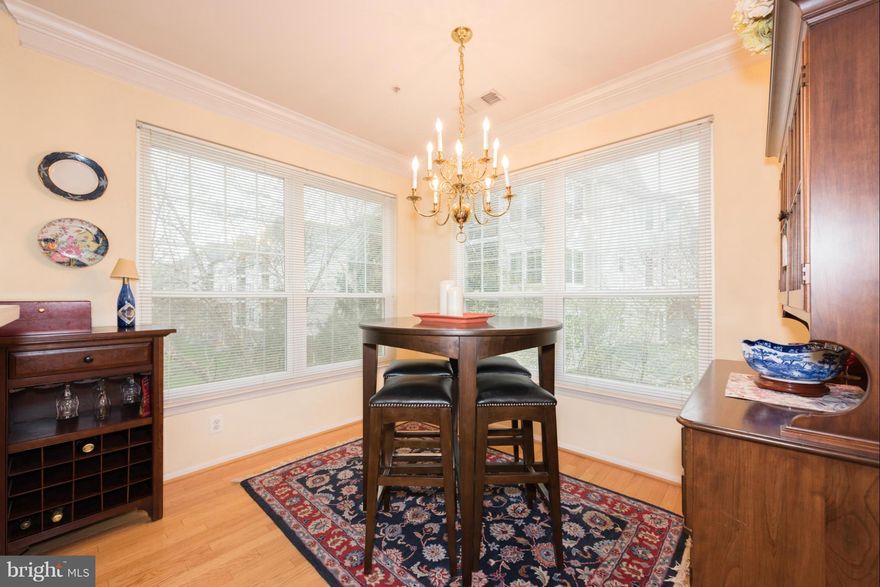 Quiet + sunny 2BR, 2BA Chandler unit facing pool + ctyrd. Dining lined w/windows. Deck access from the living rm. Bay wind. + WIC in MBR. Storage cabinets + shelving in laundry rm. BIG Bonus: Add l storage rm in the bldg conveys! Brand new HVAC. 1 prking spot conveys + assume 2nd leased spot assume for $100/mo. <0.5 mile to the Silver Line! GOM amenities: Gate entry, Clubhouse, Exercise room,Pool.