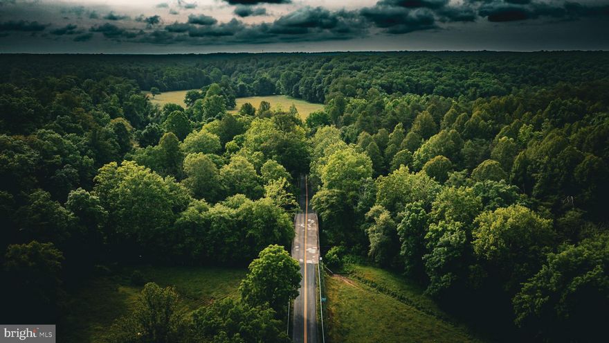 Discover 32± acres of prime land with ample frontage along the scenic North Anna River, offering the perfect blend of recreational appeal, natural beauty, and future potential. Spread across two parcels, this property features rolling topography, diverse habitat, and a tremendous stand of mature hardwood and softwood timber, creating both privacy and long-term timber value. Beautiful creek bottoms and hardwood ridges make the property both scenic and full of wildlife.

Access is convenient from both Mallorys Ford Road to the north and a gravel road to the east, with a paved driveway already in place leading to the property's highest knoll. This elevated site has been thoughtfully thinned, presenting an ideal location for a home, camp, or destination food plot. Soil work was completed in 2006 for a 3-bedroom home, paving the way for future development. Outdoor enthusiasts will appreciate the excellent deer and turkey hunting opportunities, as well as the close proximity to Lake Anna and easy access to US-15, US-33, and the nearby towns of Gordonsville, Orange, and Louisa.