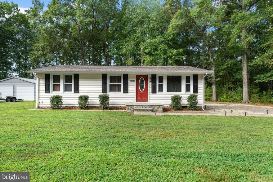 Welcome to this charming, cozy ranch-style home. This move-in-ready property features 3 spacious bedrooms and 1 full bath. The living room and bedrooms feature plush carpeting, creating a cozy and welcoming ambiance. Meanwhile, the full bath includes a convenient shower-tub combo and a pristine white vanity. The modern eat-in kitchen boasts stunning granite countertops, sleek stainless steel appliances, and stylish dark tile backsplash. The home is set on a large, serene lot with mature trees, offering a tranquil retreat from the hustle and bustle of everyday life. Situated just minutes from Route 1 and I-95, you can enjoy the convenience of quick access to major routes while still savoring the peace and quiet of country living. Don’t miss this opportunity to make this renovated gem your new home!