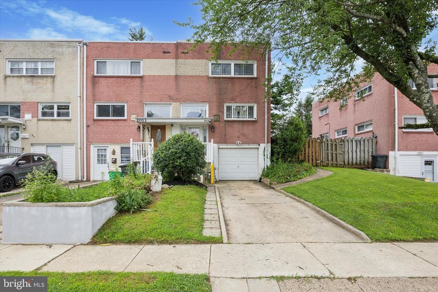 Welcome to 2015 Ravenwood Rd – a beautifully maintained end-unit townhome in the desirable Ravenwood community! This charming 3-bedroom, 1-bath home offers 1,296 square feet of comfortable living space, featuring hardwood floors throughout and a fresh, neutral color palette that compliments any style. Enjoy peace of mind with a brand new central A/C unit and newer heater and appreciate the convenience of an attached garage with private driveway parking. The finished basement provides flexible space for a home office, playroom, or extra storage. As an end unit, this home boasts a fenced-in side yard, perfect for pets, play, or gardening, along with a private back patio for relaxing or entertaining. Pride of ownership shines throughout—this is a truly move-in ready home in a quiet, welcoming neighborhood with easy access to shopping, dining, and major routes. Don’t miss your chance to own this gem in Ravenwood!