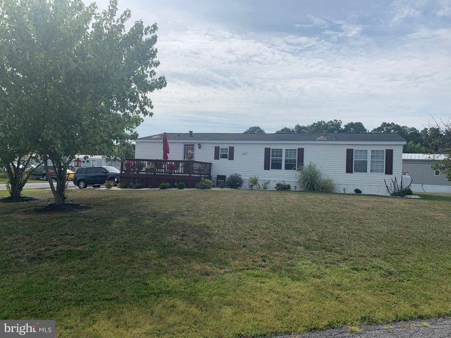 This 1995 Doublewide is extra large with a huge open floorplan on an oversized corner lot. 3 large bedrooms, 2 full bathrooms, large shed and priced to sell. More photos of inside will be posted soon. Please verify ground rent of $453 with manangement company. Buyer must be approved by monangement company prior to closing.