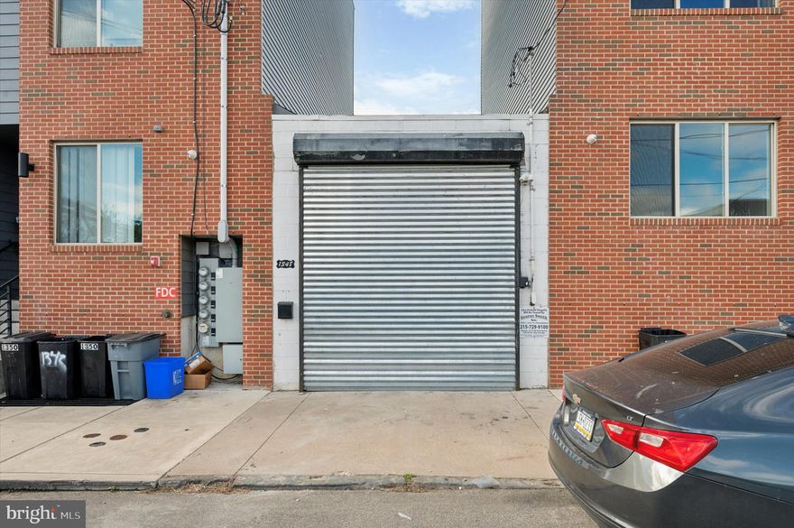 Rarely offered GARAGE in great part of Grays Ferry! Surrounded by new construction...invest in a HOT area of the city...approx 700'ft HEATED garage with a 250'ft loft and separate office area in the back with a conveniently located POWDER ROOM. Great for small business owner storage, or car storage, 
 but also zoned RM1, so there is the ability to build 2 stories above garage (assuming city permits can be obtained). THIS IS A NO BRAINER. Check this out today!