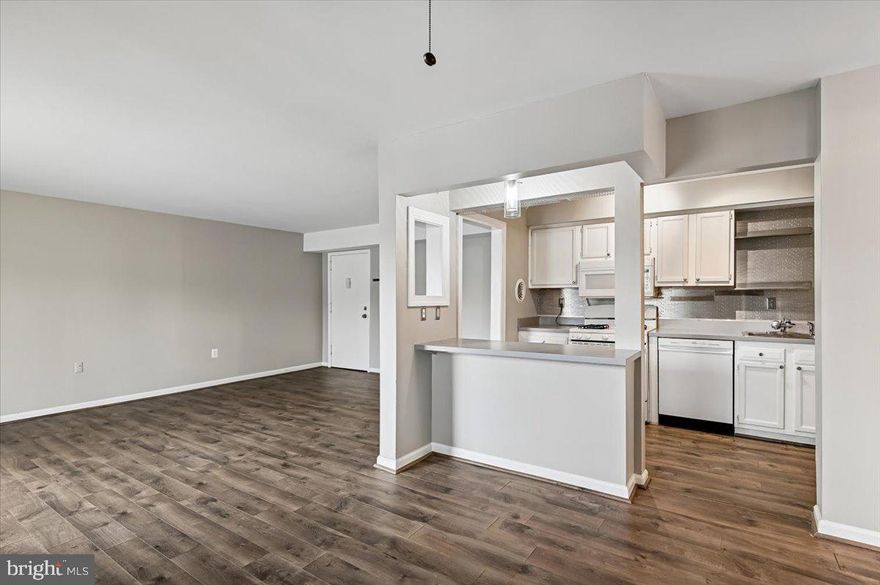 Welcome to Fairwinds of Annapolis, this delightful 2nd floor 2-bedroom, 2-bathroom garden apartment offers a perfect blend of comfort and convenience. (Furnace 2021) The open kitchen floor plan invites you to experience a warm and inviting atmosphere, ideal for entertaining over the breakfast bar. Natural light floods the living spaces, creating a cozy ambiance. The neutral kitchen features a built-in microwave, a Brand NEW (dishwasher 2026), and gas oven/range, making meal preparation a joy. Enjoy casual dining in the dedicated dining area or unwind in the spacious living room. The entry-level bedroom provides easy access and privacy, while the primary suite boasts a generous walk-in closet dressing area and ensuite bathroom, with ample storage for all your needs. Step outside to discover a vibrant community with amenities that enhance your lifestyle. Walk to the grocery store and coffee shops. Enjoy sunny days at the outdoor pool, engage in friendly matches on the tennis courts, or take leisurely strolls along the jogging paths. The association takes care of maintenance, including lawn care and snow removal, allowing you to focus on what truly matters. With convenient in-unit laundry facilities and off-street parking, this home is designed for modern living. Experience the perfect blend of comfort, community, and convenience in this inviting residence. **Pet Friendly** Don't miss the opportunity to make it your own! Condo fee includes Gas heating and cooking, water & sewer. Just 2.8 miles to the United States Naval Academy and 10min bike ride to beautiful historic downtown waterfront.