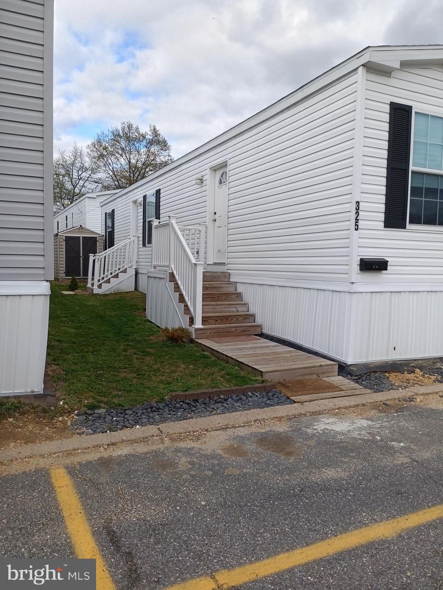 NEW PRICE!!!!BEST PRICE IN THE PARK FOR THIS MODEL !!  Not quite 3yrs old , this charming and well  14 ' X 54'   2bd,1.5baths unit in Cherry Hill Mobile Home Park could be just what you are looking for!! This well maintained unit has an open floor plan,, a full SS kitchen with double sink, gas (propane) range, built-in microwave, dishwasher, refrigerator/freezer with ice & water through  the door, washer and dryer less than 2 yrs old.  Living room and 2 bedrooms with carpeting, kitchen/dining area,  laundry and baths w/ vinyl flooring.  Heat and cooking is by  propane gas,the water heater is electric.   Recessed lighting throughout.  The Central Air is electric. and unit has 100amp electricity.     Existing Living room and dining area furniture will be included  unless buyer does not want to accept it.  There is a lot rent payment  of $900 /month that covers taxes, sewer, water, CCMUA and trash and recycling .  Applicants  must be approved by the  Park management to buy in this park.    BONUS:    BUYER OF THIS UNIT WILL RECEIVE A BONUS  FROM  THE SELLER OF PAYMENT OF THEIR  FIRST 2 MONTHS OF  LOT RENT FOR THE BUYER!!!   minimum monthly income required  of 3 times the lot rent, credit score of 650 and cash and assets to buy using a loan or all cash. Occupancy is for 3 people. Well maintained and financing is available - loans must be through Mobile home lenders  or cash.  Pets are permitted, one per household  with restrictions as to size  and breed as per the ADA.  Come see this adorable unit that still has approx 4.5yrs of  manufacturer's construction warranty  remaining on this gently used unit. You won't be disappointed!!!