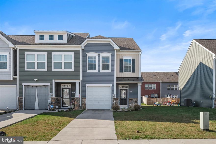 Discover the charm of this beautifully designed end-of-row townhouse in the desirable McCauley Crossing community. Built in 2019, this Colonial-style home offers 1,696 sq. ft. of inviting living space, featuring 3 spacious bedrooms and 2.5 bathrooms, perfect for comfortable living. The open layout is ideal for entertaining, while the attached garage provides convenient access and storage. Enjoy modern amenities  and a thoughtful design that maximizes natural light. . Embrace the opportunity to make this lovely townhouse your next home, where comfort and convenience await. Schedule a tour today and envision your future in this delightful space!