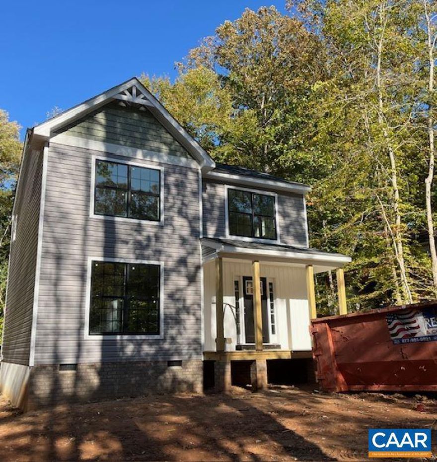 INTERIOR FINISHES UNDER WAY (10/27) Ask how you can receive up to $7,500 in SELLER PAID CLOSING COSTS! The Hill Model at Lake Monticello. The newly designed main living area features an open concept floor plan creating a spacious living area with 36" kitchen cabinets, stainless appliances, 10x12 rear deck, three bedrooms upstairs with pull down attic space for storage, primary bedroom with ceiling fan, LED lights in the other two bedrooms, adult height elongated toilets in the primary and half bath. Exterior upgrades include shake and board and bat siding, wide white window trim instead of shutters and a gable accent that leads you to the welcoming front porch. Black windows on the front of the home and black gutters. Photos are of a previously completed Hill model. JANUARY completion.,Formica Counter,Wood Cabinets