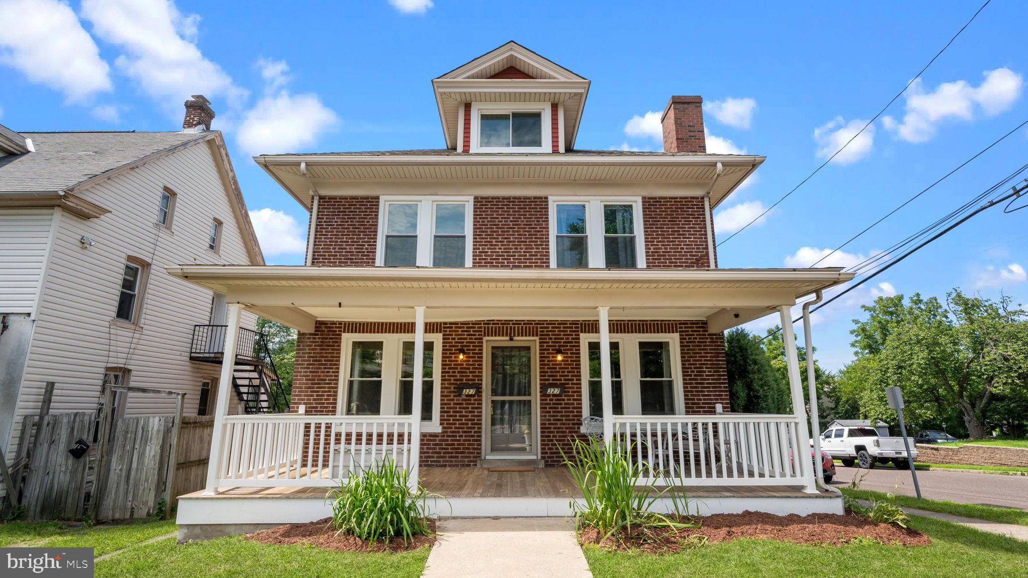 Charming In-Town Souderton Home with Income Potential! Welcome to this spacious 4-bedroom corner home located in the heart of Souderton Borough—perfect for owner-occupants or seasoned investors looking for their next property! This unique home offers a generous layout featuring a large living room with a beautiful stone fireplace and mantel, a formal dining room, and a full kitchen with a convenient laundry area and outdoor access. Upstairs, you'll find four comfortable bedrooms plus a large unfinished, floored attic on the third floor—ideal for storage or future expansion. The front porch has been beautifully updated with tongue & groove mahogany flooring, PVC railings, and a fully renovated masonry foundation—creating a cozy spot to relax with your morning coffee or a good book. The lower level features a private 1-bedroom apartment with a separate entrance—perfect for generating rental income or accommodating guests or extended family. In the back, you’ll find a two car detached garage (each currently rented for extra income) and off-street parking for 3–4 cars. Enjoy a short walk to downtown Souderton’s coffee shops, restaurants, art galleries, and local boutiques. Conveniently located near Route 309 and just 5 miles from the Northeast Extension of the PA Turnpike. Whether you're looking for a place to call home or an investment opportunity with strong income potential—this property has it all. Schedule your showing today! Home being sold "as is" condition.