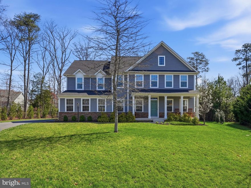 Gorgeous ​turn-key nearly new Dream Home located inside the ​luxury gated lake and golf community of Fawn Lake! Featuring a flowing interior accented with luxury elements designed for today's modern lifestyle. With 4800 SQ FT of exceptional interior space, this residence is designed for both casual daily living and effortless entertaining. The modern bright and open floor plan features exquisite finishes such as quartz countertops, wide plank wood floors and large windows elevating the spaces throughout the home. 

A charming front porch welcomes you inside to an inviting two- story Foyer, which is anchored by a Formal Dining Room, offering the perfect setting for celebrating special diners, and a handsome private Study with French doors and built-in bookcases.  

Flooded with brilliant sunlight, a wonderful Great Room with a stunning Fireplace and tall windows overlooking the wooded backyard sits at the heart of the home.  

The beautiful Gourmet Chef's Kitchen features white Cabinetry, Quartz countertops, large center island, stainless steel appliances, gas range and walk-in pantry, serving as the ideal space to cook meals and host guests for dinner. The adjoining sunny Breakfast area leads to an inviting covered porch, perfect for outdoor living and entertaining. 

A gracious main level Bedroom with a beautiful Full Bath and walk-in closet is perfect for guests. 
The spacious Mud Room with built-in drop zone helps keep things tidy and organized.

Thoughtfully designed, the upstairs level offers a multi-function Flex space​ and bedrooms. A perfect sanctuary, the fabulous Owner's Suite with ​sitting area, features a luxury Spa Bath with tile shower and double vanities, plus two amazing walk-in closets! 

A Gracious en-suite with Private Bath, and two additional Generous Bedrooms with walk-in closets​, anchored by a Full Bath with dual vanities, offer ample space for the whole family. ​

The laundry room is conveniently located on the upper level. 

The finished basement features a ​huge Recreation Room​, Full Bath, plus a ton of space for future expansion and storage!  

An inviting covered porch is perfect for unwinding after a long day and enjoying breathtaking sights and sounds of nature.
Set against a backdrop of mature trees, the porch offers optimal space for extended outdoor living, alfresco dining, and entertaining! 
 
Nestled ​on a quiet cul-de-sac with​ beautifully landscaped grounds and manicured lawn.​ 

The 2-Car Garage and extended driveway offer plenty of space for vehicles! 

You will live with ease in this luxuriously beautifully designed turn-key dream home built in 2021. Don't miss this incredible opportunity to own a newer Home in one of the most prestigious addresses in the Fredericksburg area!

​The beautiful luxury and vibrant Fawn Lake Community offers amazing amenities such as a boating recreational lake, sandy beach, an Arnold Palmer designed Golf Course, pickleball and tennis courts, baseball and soccer fields, dog park, volleyball courts, walking trails, Community ClubHouse, marina, fitness center, restaurants, Country Club, playgrounds, and so much more! Plus with an array of clubs, groups and daily activities, you will have plenty of opportunities to join the social scene, make new friends and remain active! Located in the countryside near the town of Fredericksburg, surrounded by park lands and only a few miles to the farm market, wineries, and award winning breweries! Conveniently located to shopping, restaurants, top-rated Riverbend District schools and I-95! 
Discover refined living in the prestigious lake and golf community of Fawn Lake.