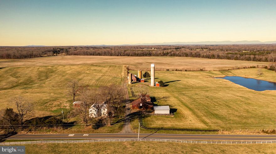 Welcome to Spring Knoll Farm! Located just a couple of miles southeast of Midland lies this immaculate income producing farm with an extensive amount of road frontage along Midland Road as well as Ritchie Road. Composed of approximately 84 stunning acres of tillable land and 30 acres of pasture ground for your cattle or livestock. The cell phone tower on the property is disguised as a silo and brings in more than $1,500 a month for the next 50 plus years! This cell tower has the capabilities of taking on more providers so the income could go up significantly in the future. Currently being leased for crop and hay production bringing in $4,450 each year. This parcel will continue to stay in its original state as it is protected from development by the Virginia Outdoor Foundation’s conservation easement program. Under the conservation easement, this parcel is eligible for a new home to be built up to 2000 square feet and the existing home can be remodeled or replaced with no square footage limitations. The existing home has over 2,200 sq ft of living space with 6 bedrooms and 2 full bathrooms. There are numerous outbuildings including 2 barns, 2 equipment sheds, a carport, and a run-in shed to shelter your equipment or belongings. Located towards the northern side of the farm is a large pond that supplies water for livestock and attracts many species of waterfowl. This parcel has a very subtle change in topography with only about 30 ft of elevation change across the entire farm. Contact us today for more details or to schedule a private showing of this elite farm! DISCLOSURE: Property to convey “AS-IS”. All inspections will be for informational purposes only. Do not drive in the crop or pasture fields and do not block the road leading to the cell tower silo. Farmer growing crops reserves the right to harvest his crops this coming fall and/or winter. Shown by appointment only and must be accompanied by a licensed agent.