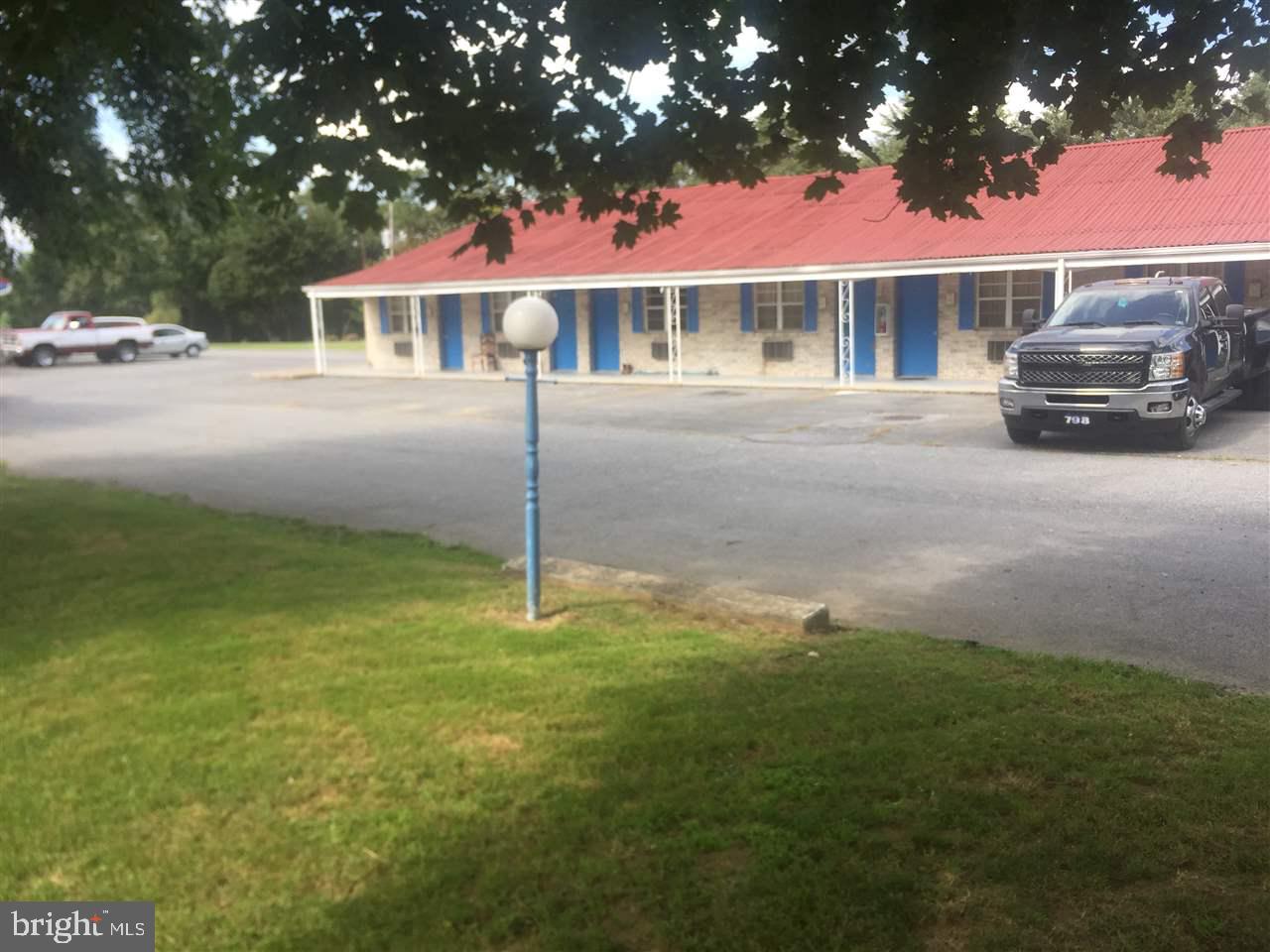 Multiple use property. 24 Motel rooms. 202 Storage units. Office building. Room for expansion.