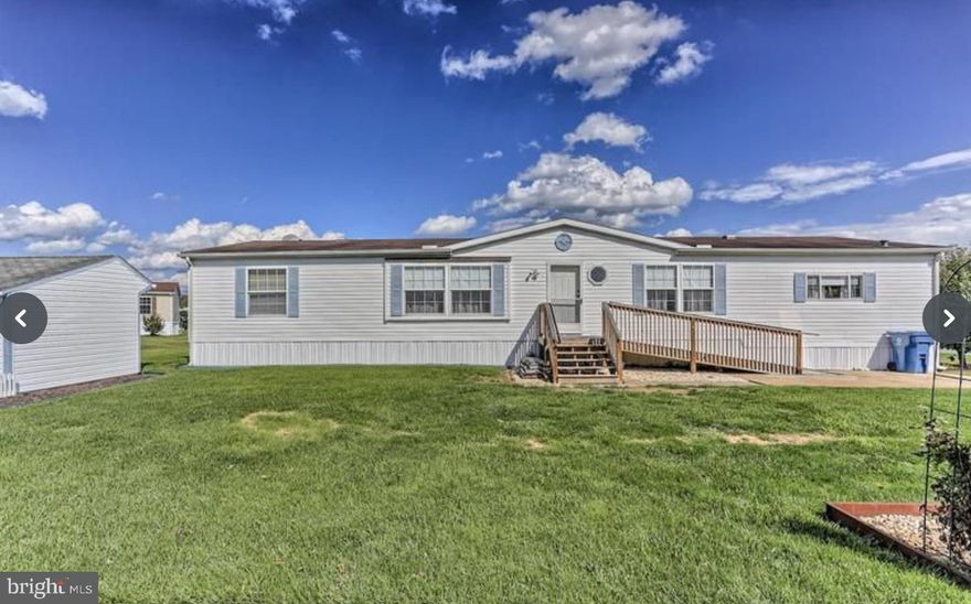 Come tour this well maintained spacious double wide, sitting on the best lot in the Lakeside community. Featuring 3 Bedrooms and 2 Full baths. The home has cathedral ceilings giving it an even more spacious vibe. Lot's of Natural light fills the home. The main entry way has a few steps or a ramp for your convenience. Lovely lot with mature landscape, shed and garden area. 

You will have peace of mind with the newer items in this home, to include new carpets in 2 of the bedrooms in 2025; a new refrigerator, electric oven, vent hood, dishwasher, and microwave in 2024; a new roof in 2018; and a new washer, dryer, and 3 Ton HVAC in 2017. Home has laminate flooring throughout most of it and carpet in the two smaller bedrooms. 

Monthly lot rent includes trash and snow removal plus there is a community pool and fitness equipment!  Convenient location close to shopping, restaurants, and interstate. All buyers must be approved by the mobile home community.

Home can be purchased with Cash, Personal Loan, HELOC or Mobile Home Lender- 21st Mortgage is a recommended lender.  The community does not allow homes to be rented out.

Seller is motivated and is open to all reasonable offers, so schedule your showing to see this beautiful home today!